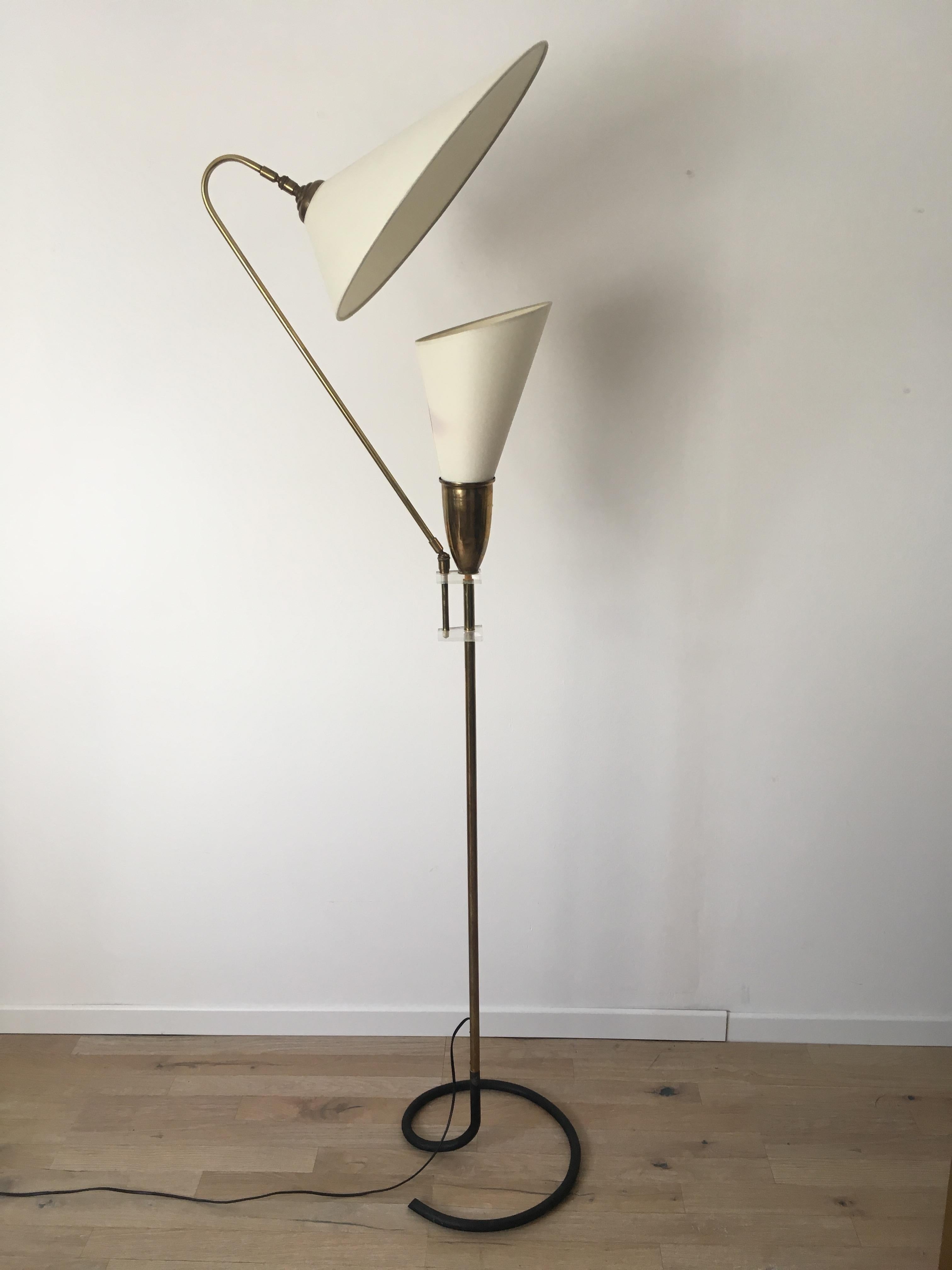 A brass and plexiglass floor lamp with 2 fabric lampshades attributed to Angelo Lelli by Arredoluce in Italy in 1950s.
A ball joint system allow to move the second brass arm with the lampshade that reflects the indirect light.
Original on/off