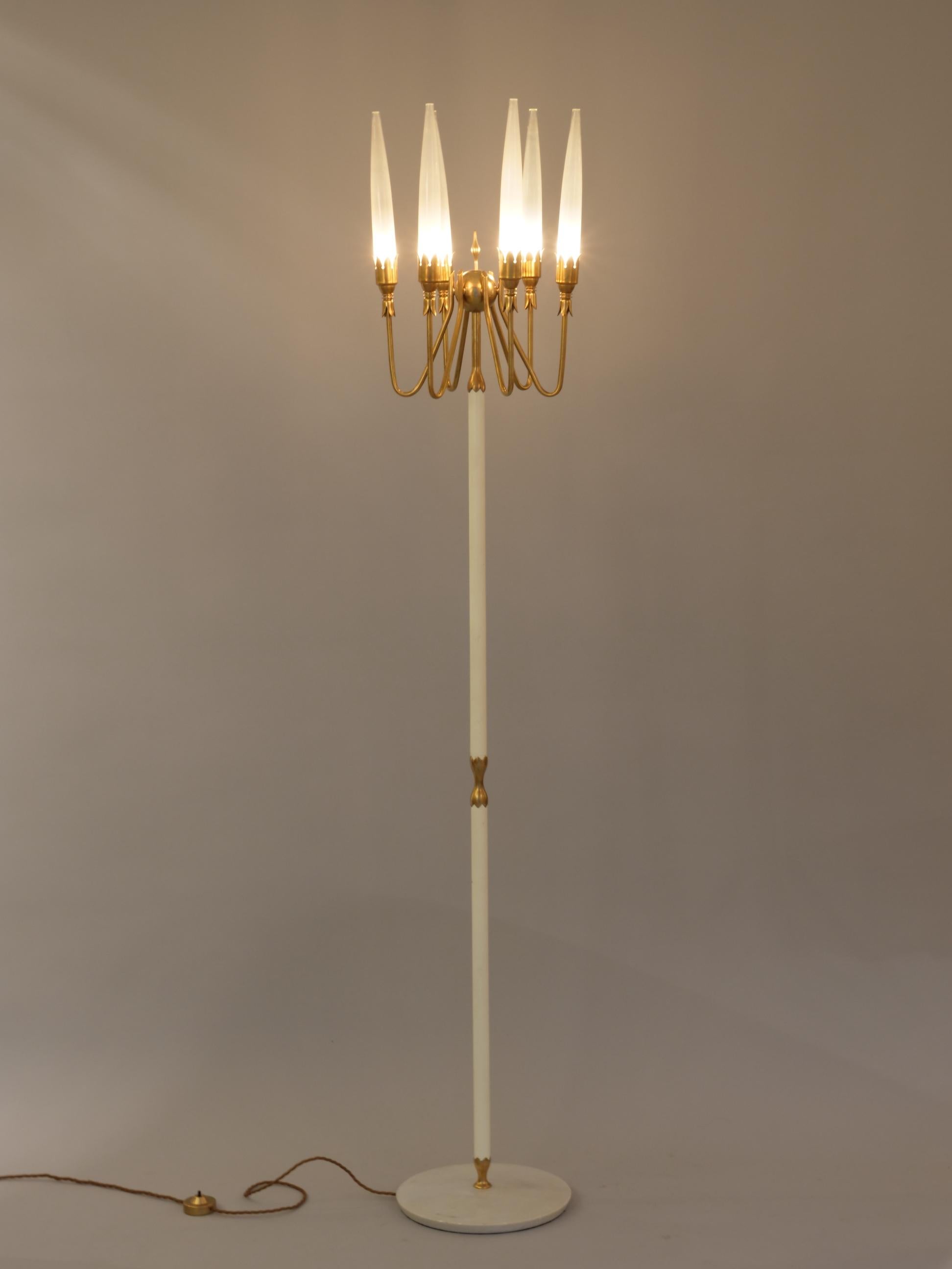 Elegant floor lamp by Angelo Leli for Arredoluce. circa 1954.

Six opalescent shades. Brass, painted metal and marble base. 

Brass floor switch, 