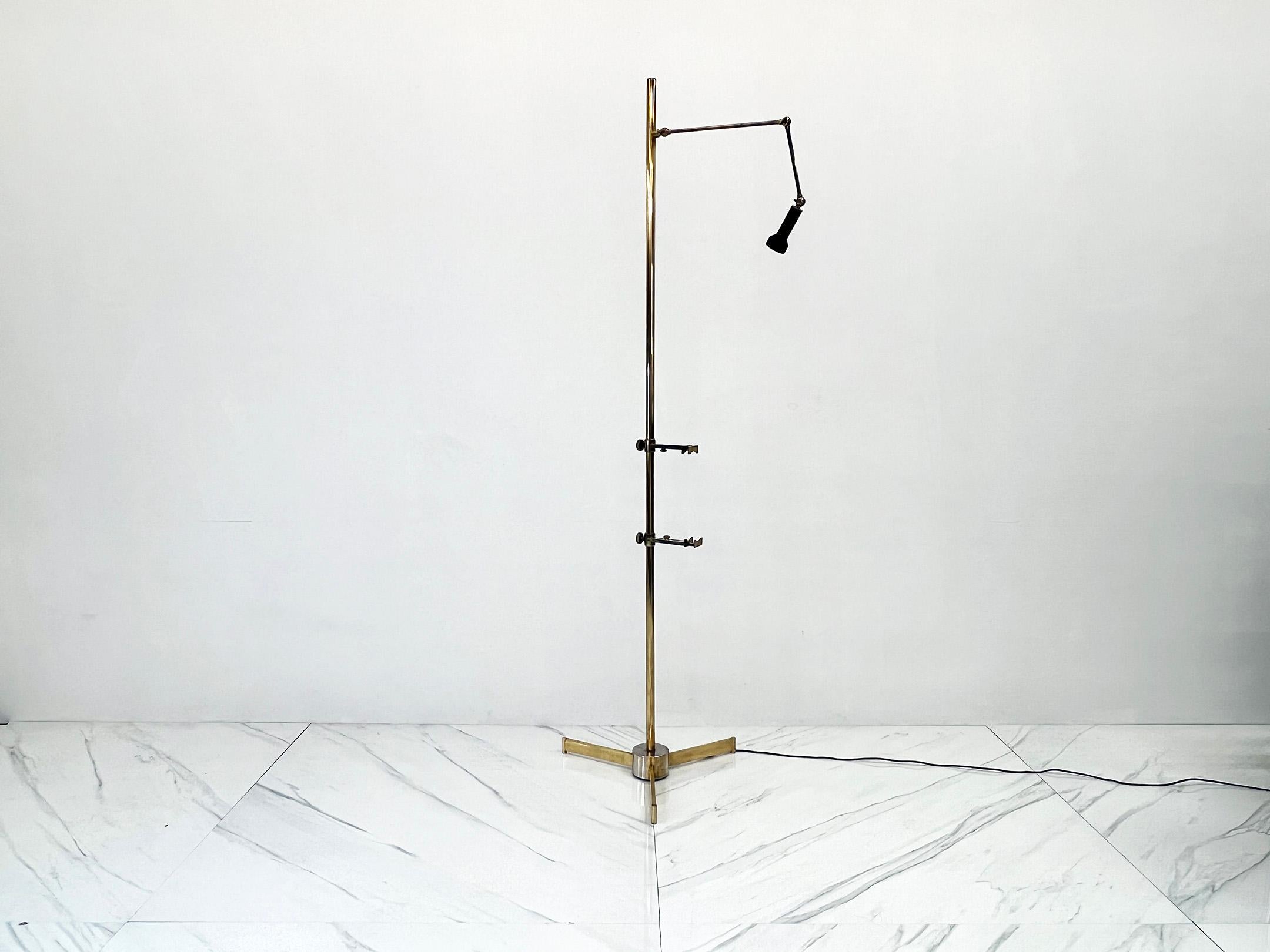 Angelo Lelli's Easel lamp is one of his most notable designs. Introduced in 1952, the Easel lamp was inspired by the form of an artist's easel and was designed to be a functional and adjustable task lamp.

The lamp features a telescoping arm that