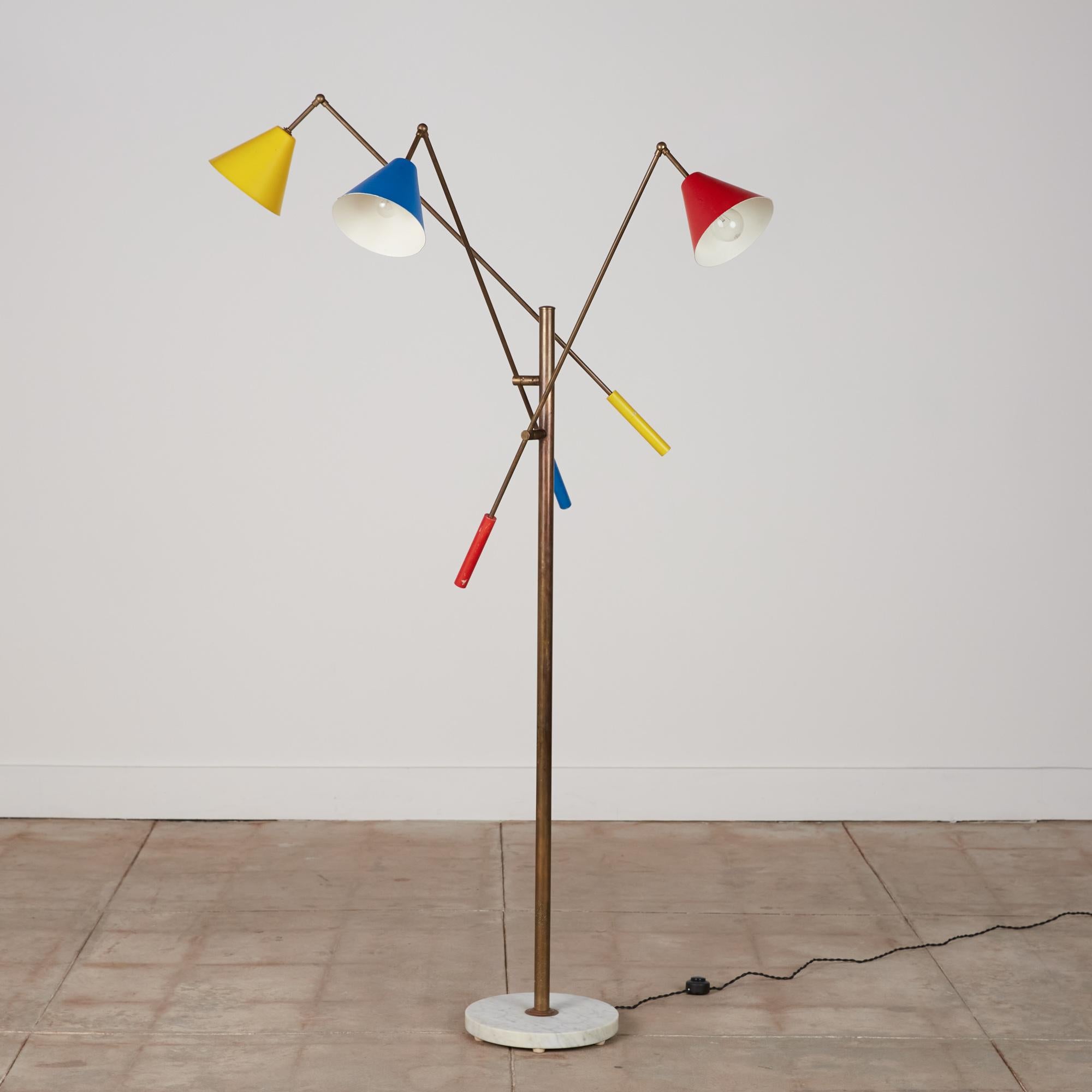 Angelo Lelli style “Triennale” floor lamp, Italy, circa 1960s. This design was originally designed by Angelo Lelli in the 1950s and produced by Arredoluce from the 1950s-1980s. The lamp features a brass stem and three brass arms with a circular