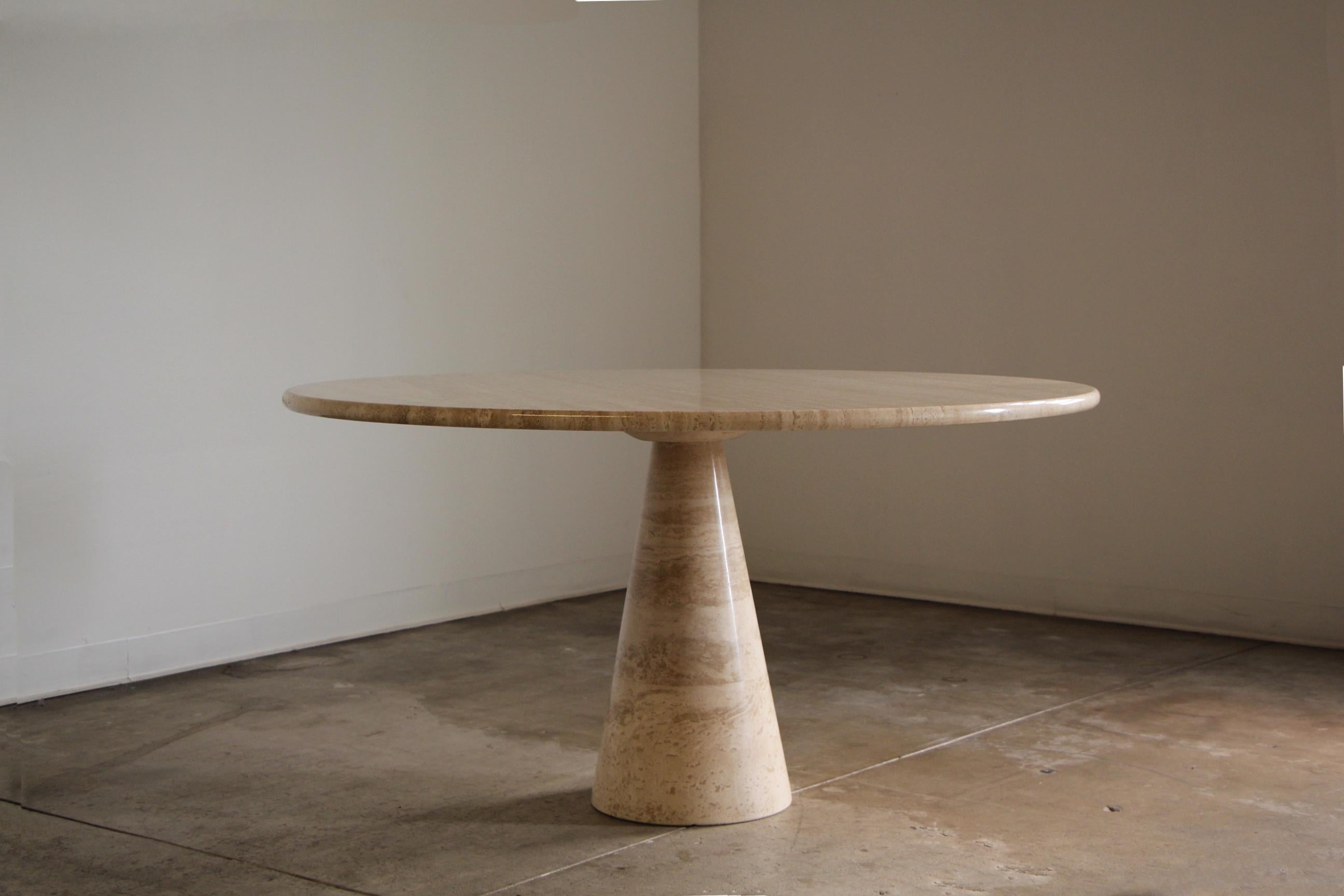 Such a stunning piece of functional art, this sculptural travertine dining table is attributed to Angelo Mangiarotti, circa 1970s, and is the much larger 55