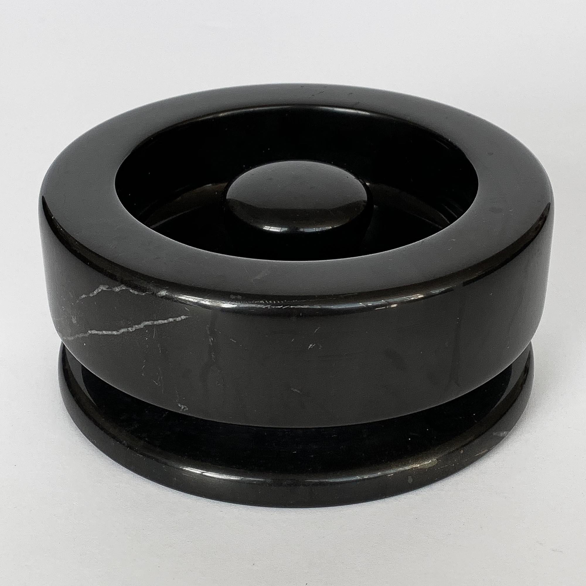Angelo Mangiarotti turned black marble ashtray for Knoll International, circa 1960s. Retains original 
