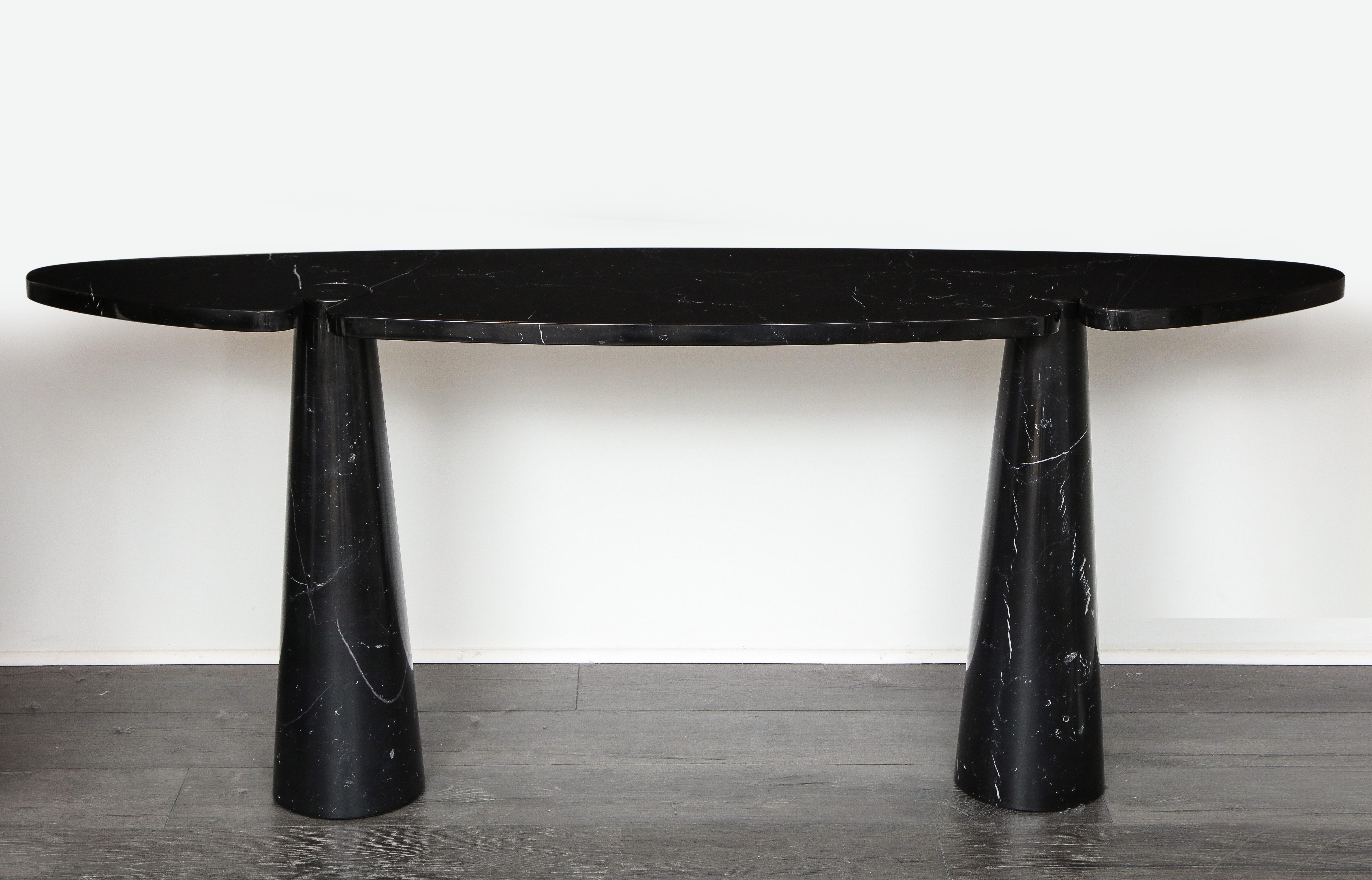 Designed by Angelo Mangiarotti for Skipper from the 'Eros' series, black Marquina marble console table with top fitted on two conical bases. This elegantly organic console table has beautiful subtle veining throughout and is from the original 1971