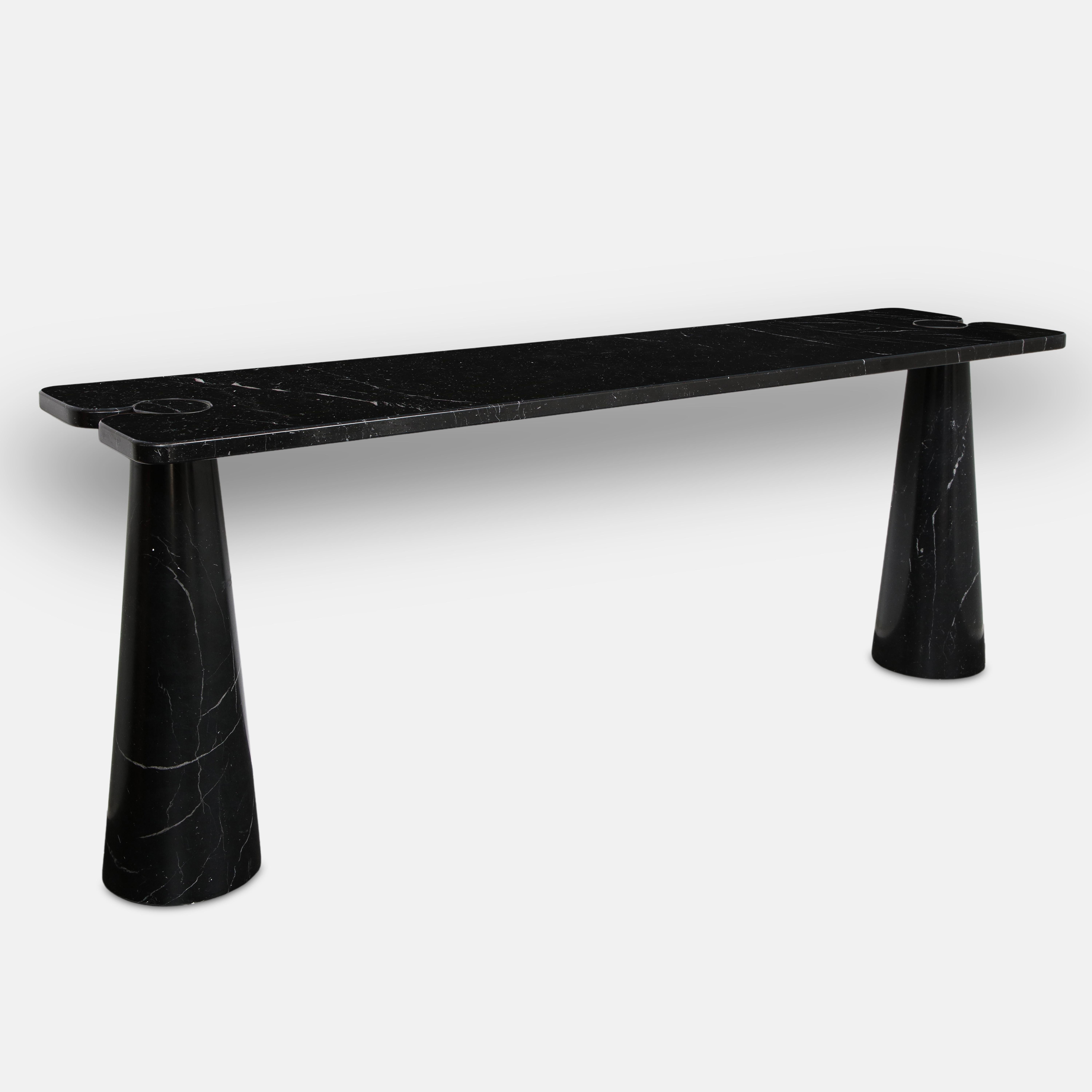 Designed by Angelo Mangiarotti for Skipper from the 'Eros' series, iconic black or Nero Marquina marble console table with top fitted on two conical bases, Italy, 1971. This elegant console table has beautiful subtle veining throughout the stark