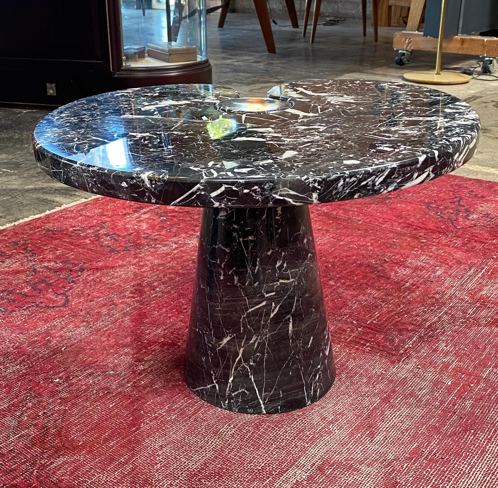 Designed by Angelo Mangiarotti for Skipper from the 'Eros' series, black Marquina marble side table with top fitted on conical base. This elegantly organic table has beautiful subtle veining throughout and is from the original 1971 production for