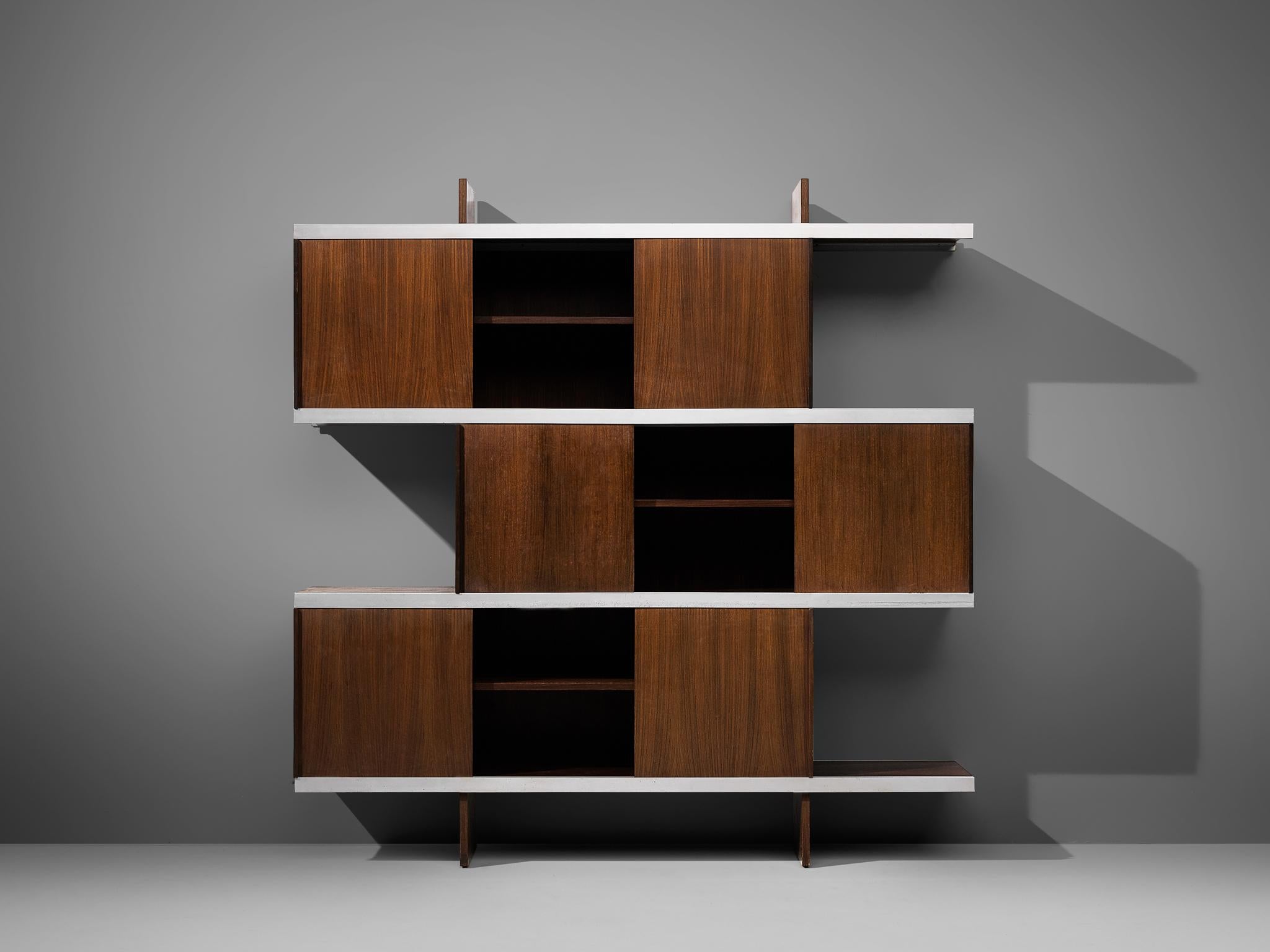 Angelo Mangiarotti for Poltronova, wall unit from 'Multiuse Series', exotic wood, aluminum, Italy, 1965

Beautiful bookcase or cabinet of the 'Multiuse Series' that Mangiarotti designed for Poltronova in 1965. Known for his designs with marble