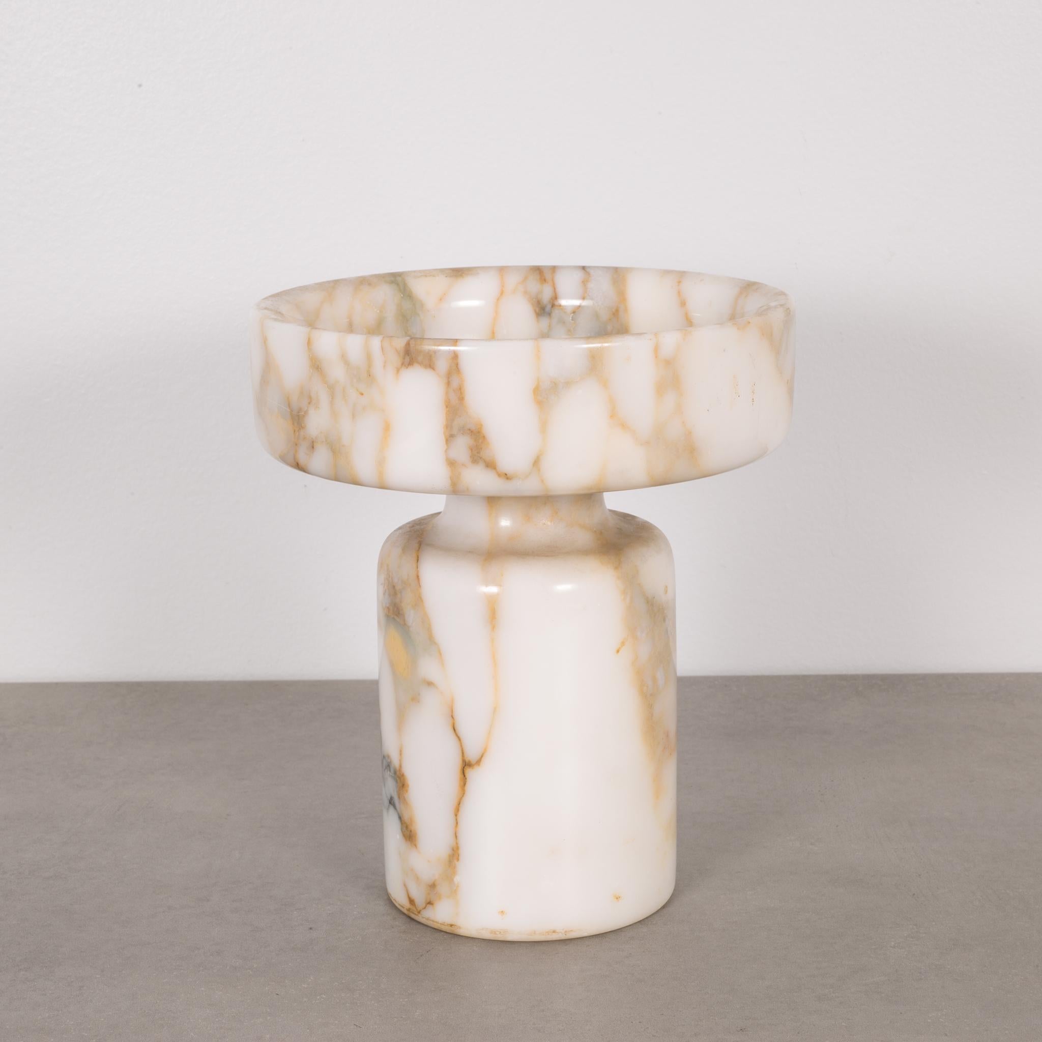 About

This is an original vase by Angelo Mangiarotti for Knoll International. This piece is reversible and can be used as a flower vase on one side or flip it over and use a a bowl. Made of solid Calacatta marble. A distinctive Italian marble of