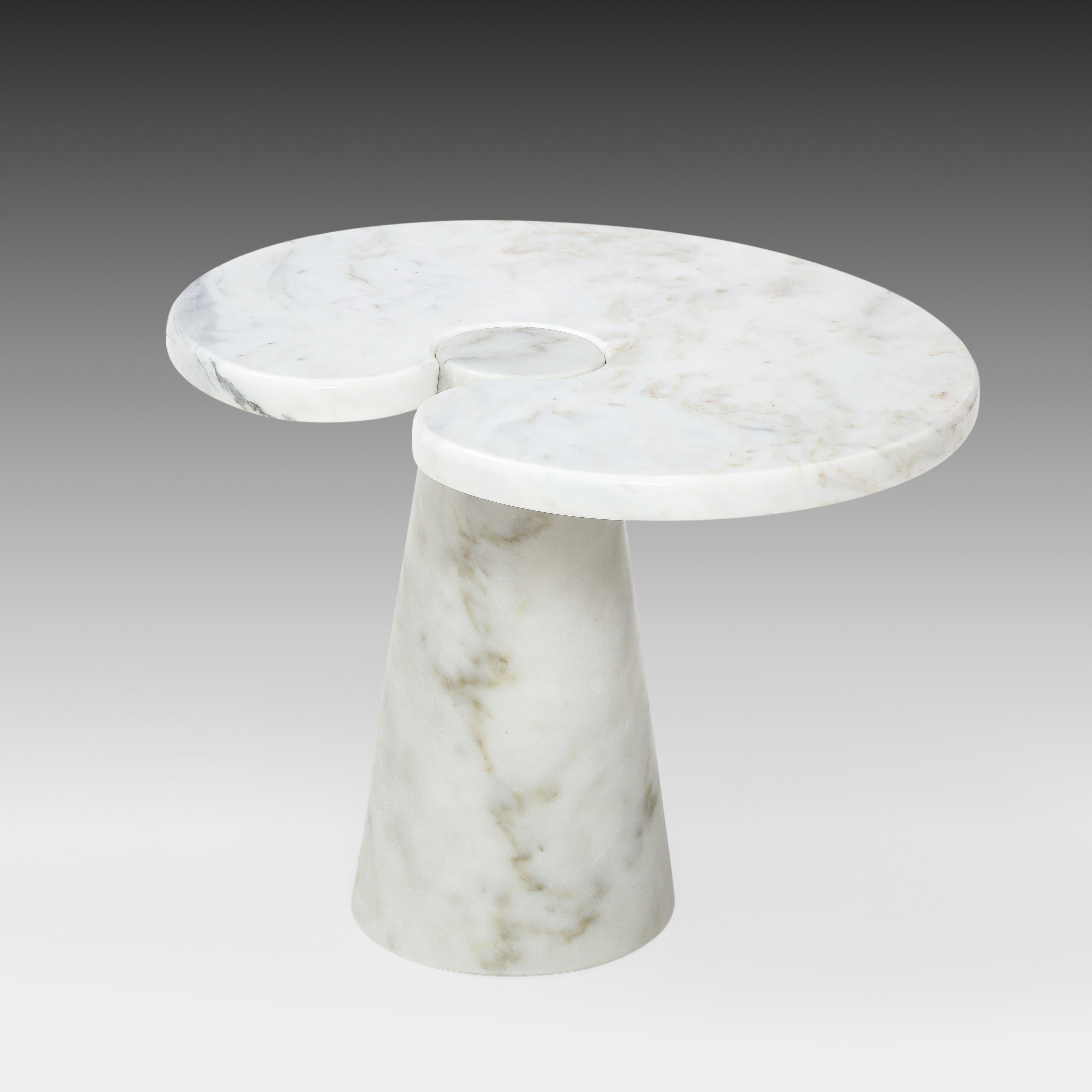 Designed by Angelo Mangiarotti for Skipper from the Eros series, Carrara marble side table with top fitted on conical base. This elegantly organic table has beautiful subtle veining throughout. Original Skipper label on underside. As the label