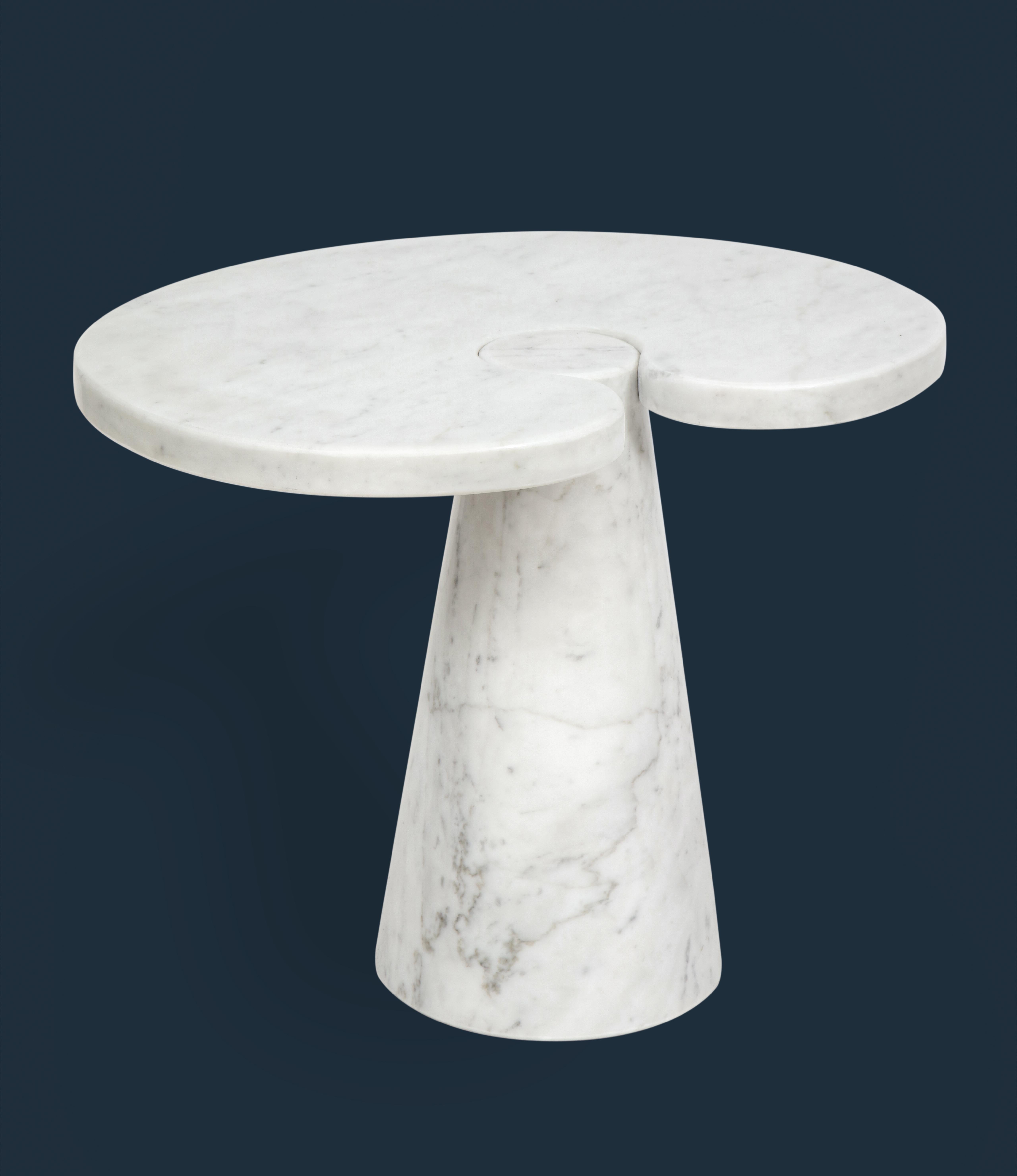 Designed by Angelo Mangiarotti for Skipper from the 'Eros' series, Carrara marble side table with top fitted on conical base.

Given Mangiarotti's research on furniture without joints, this side table is an example of the result of a gravity
