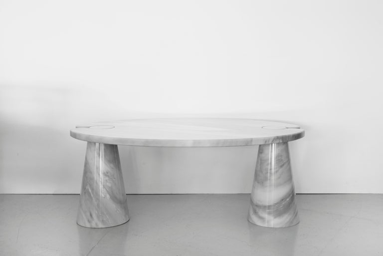 Beautiful oval white and grey Carrara marble coffee table by Angelo Mangiarotti. Two available, sold and priced individually.

  