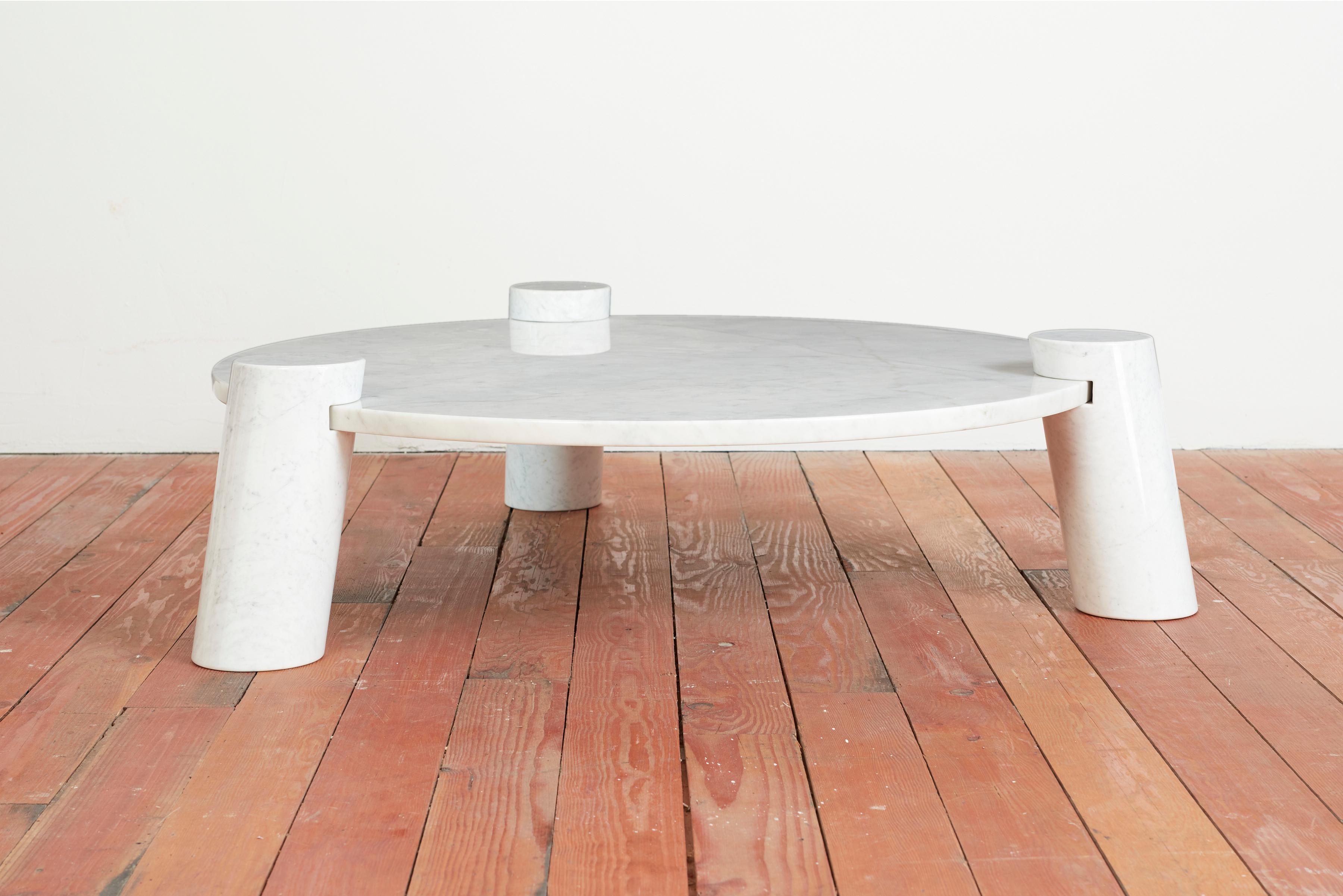 Rare white marble coffee table by Angelo Mangiarotti - Italy 1970s
Skipper manufacture with original label. 

Constructed with three inclined marble legs which recess into the top inside of each of the 3 legs. 

Exquisite piece!
