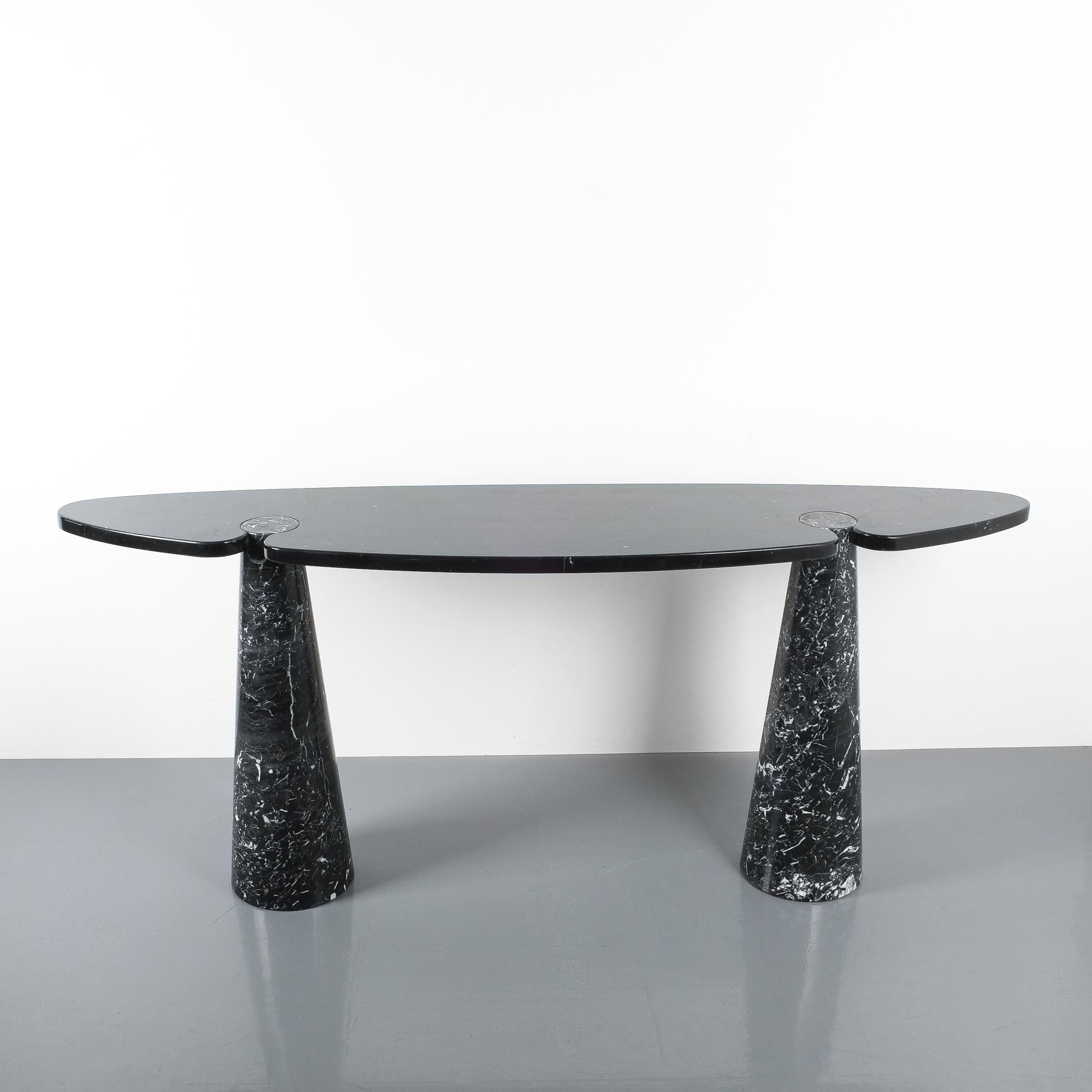 Angelo Mangiarotti console table Eros black marquina marble, Italy, circa 1975. Beautifully grained black and white solid marble piece with interlocking pedestals and tabletop. The table is in wonderful condition with hardly any wear. No chips or