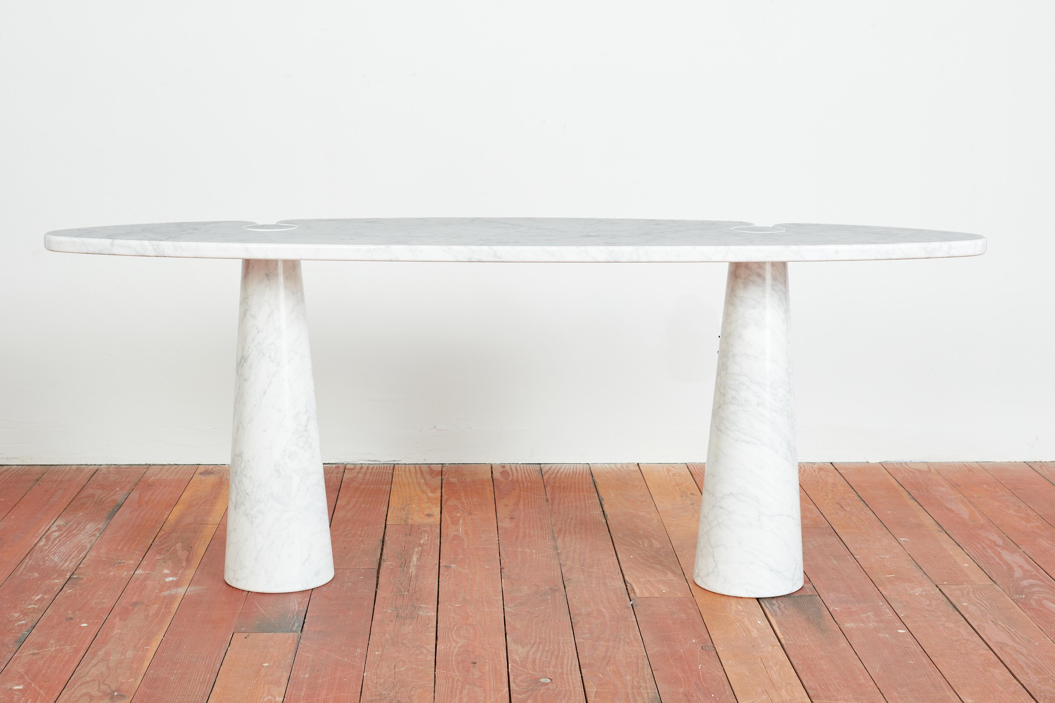 Elegant console table designed by Angelo Mangiarotti.
Skipper manufacture - Italy, 1970s. 
Original label - 
The table is made entirely of white Carrara marble.  
Table has two conical marble legs with elongated oval top
