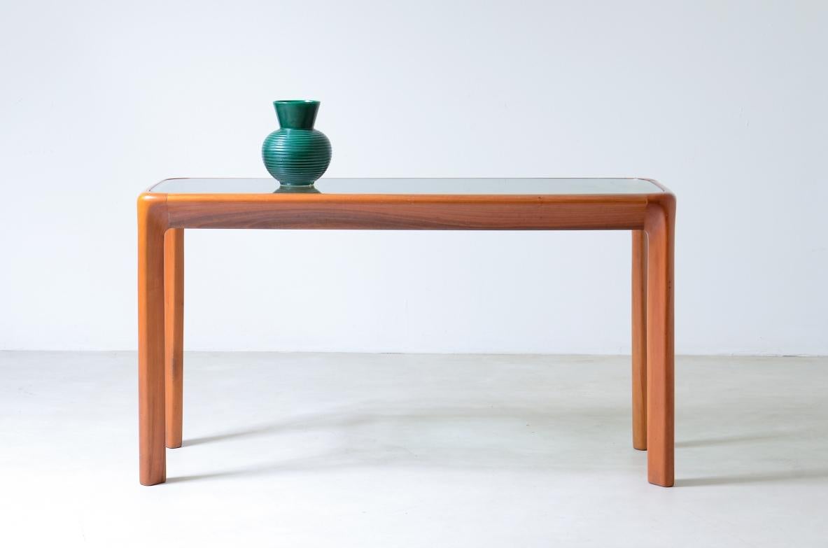 COD-2492
Angelo Mangiarotti (1921-2012)

Console table with wooden structure and thick cut glass top.

Sorgente del Mobile manufacture, Italy, 1975

130 x 47 h 72 cm