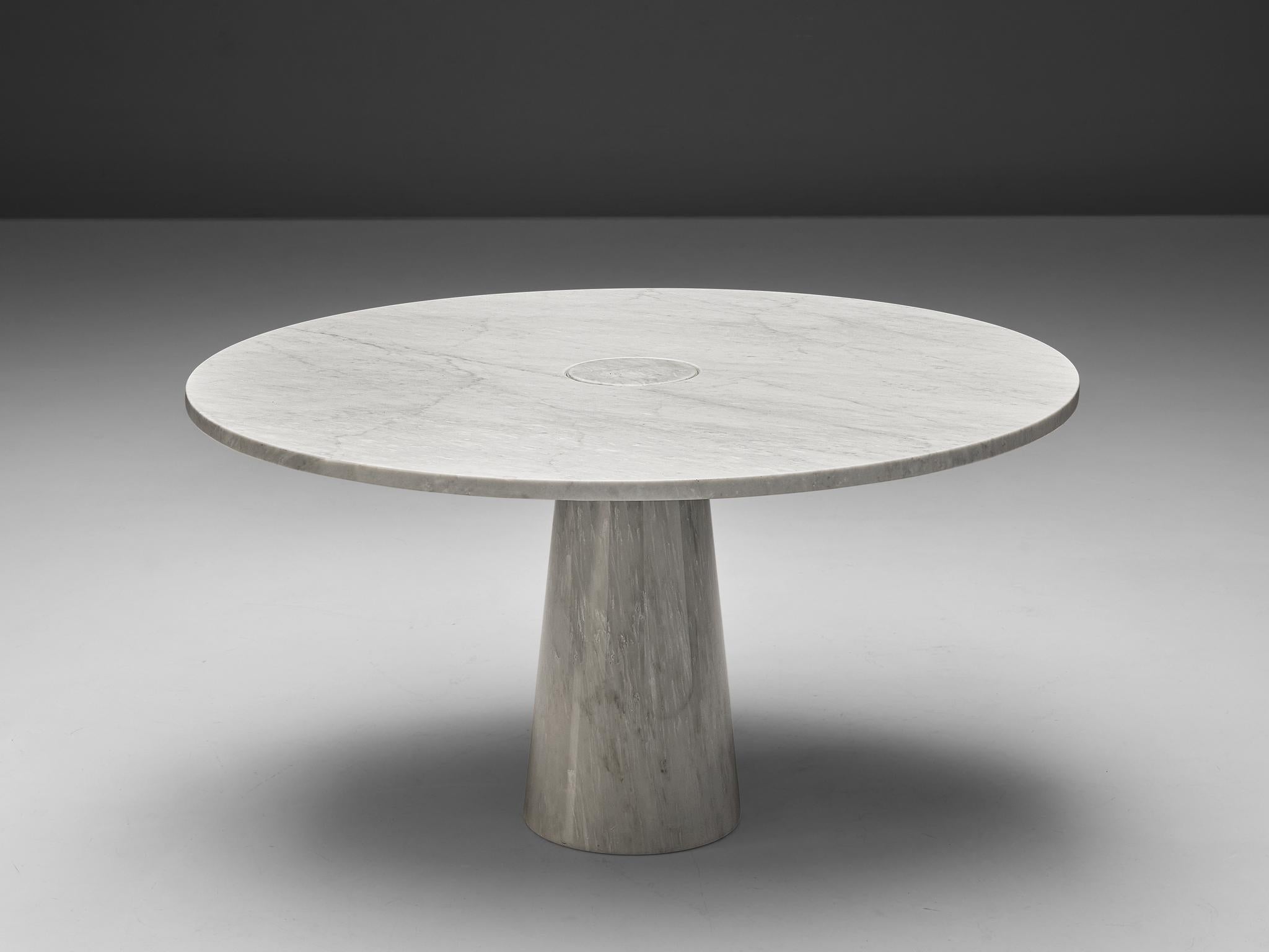Angelo Mangiarotti, pedestal dining table, marble, Italy, 1970s

This architectural table is a skillful example of Postmodern design by Angelo Mangiarotti. The circular table features no joints or clamps and is architectural in its structure