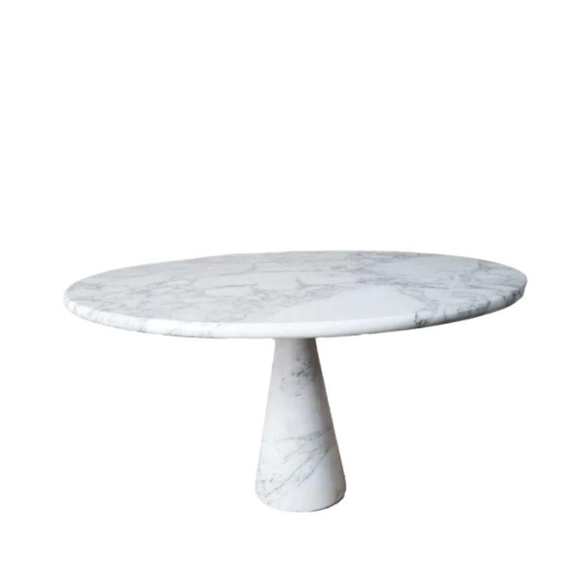 Italian dining table by Angelo Mangiarotti carved in white Arabescato marble, c.1970s.

Dimension: H71 x D130 cm.