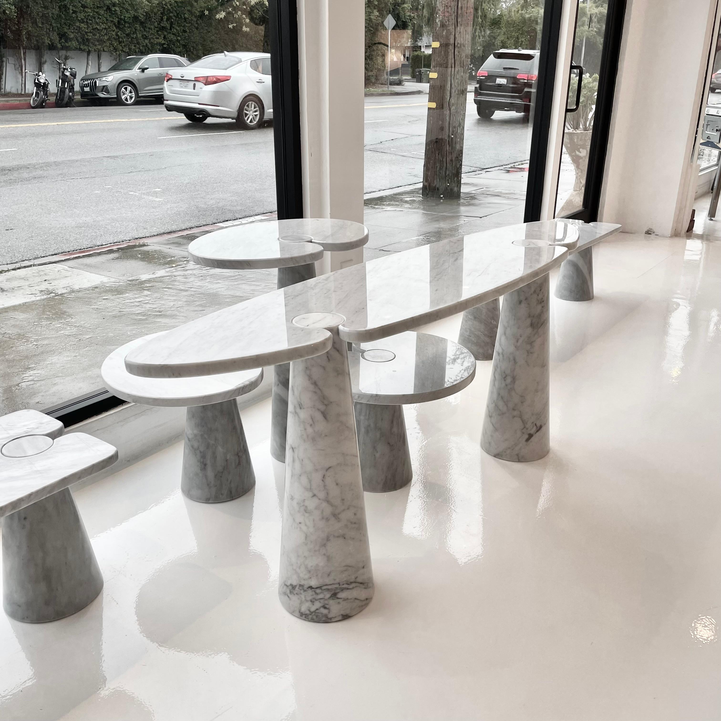 Elegant Carrara marble console table by Angelo Mangiarotti. Timeless style and simplicity as well as beautiful raw materials are what make this piece so special and sought after. Perfect to elevate any space. White and blue/grey veins run throughout