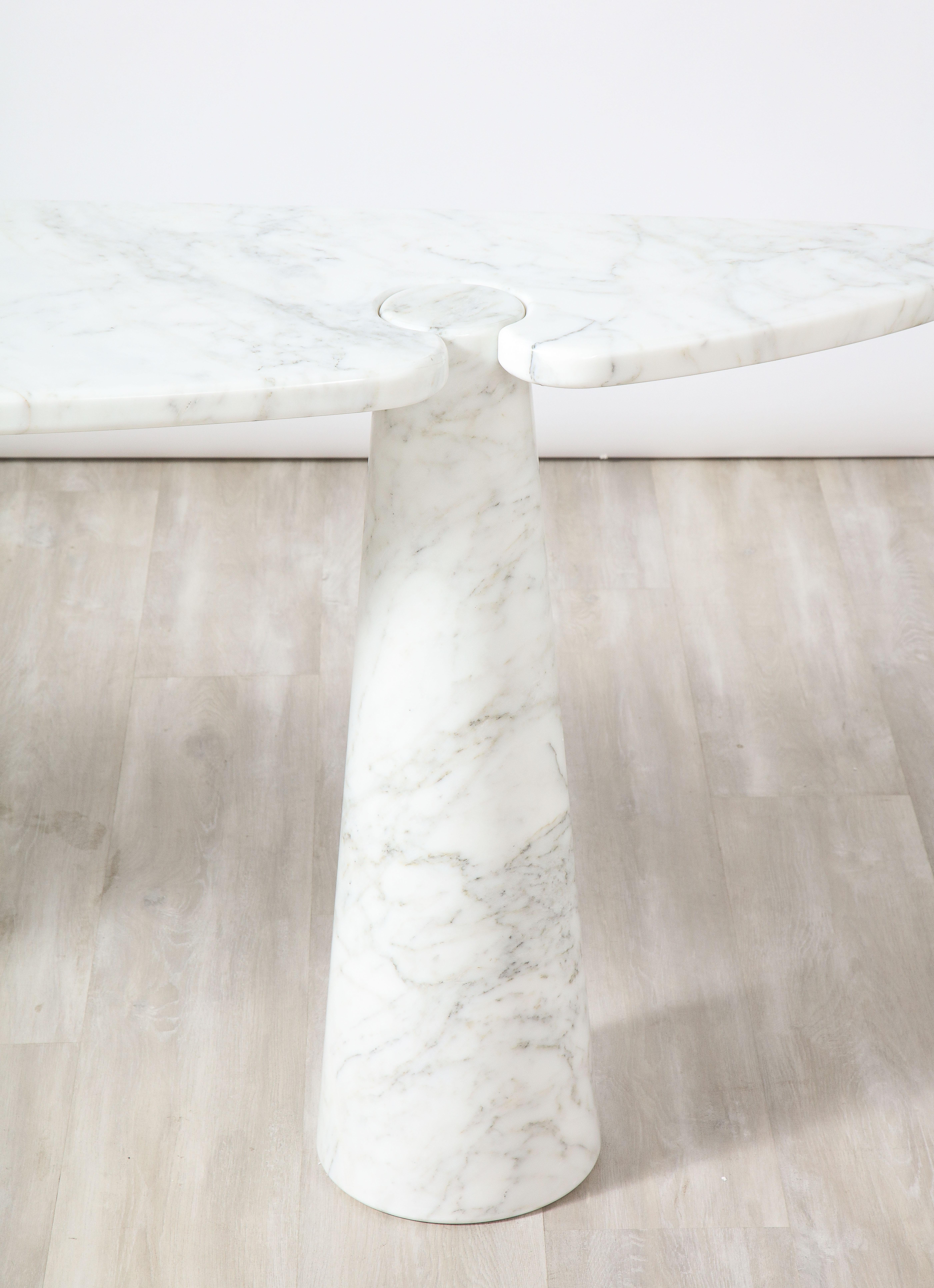 Designed by Angelo Mangiarotti for Skipper from the 'Eros' series, this iconic Carrara marble console table is supported on two conical leg bases, with beautiful subtle veining throughout the marble with organic soft curves throughout. This