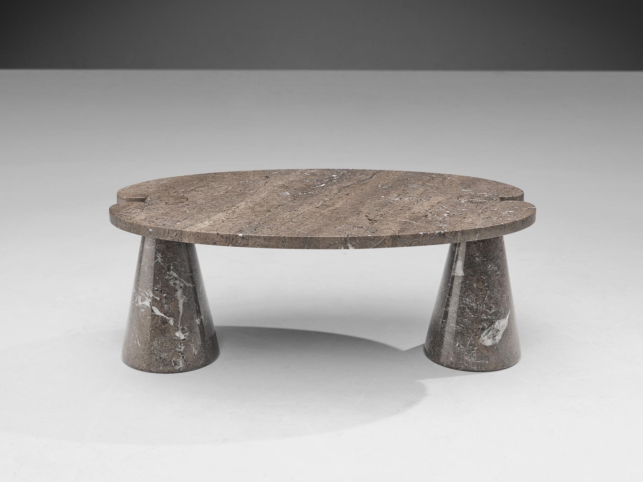Angelo Mangiarotti for Skipper, side table 'Eros', marble, Italy, 1970s.

This sculptural coffee table by Angelo Mangiarotti is a skillful example of postmodern design. The table is executed in grey marble. The oval table features no joints or