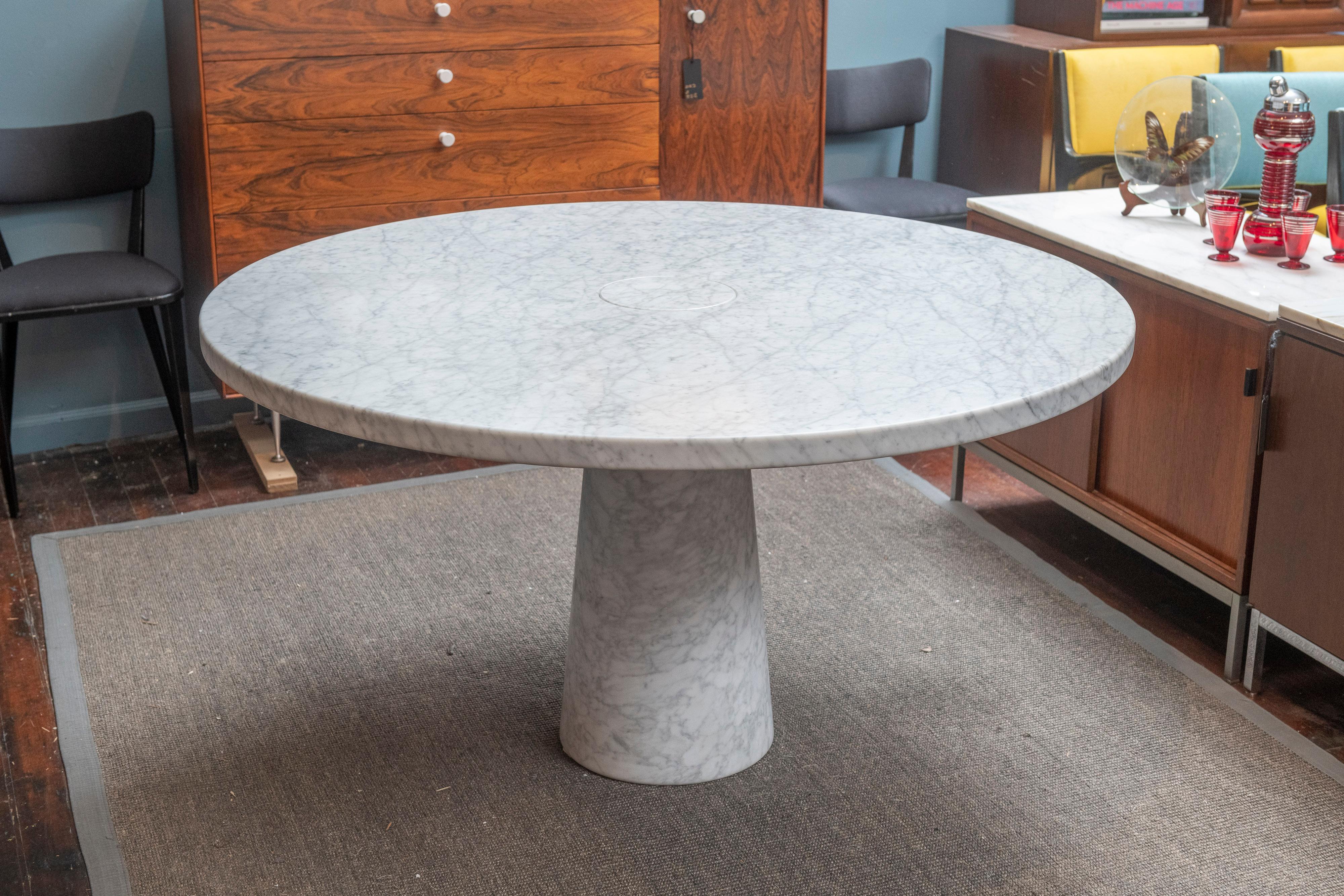 Angelo Mangiarotti design Eros series dining table for Agapecasa, Italy. Gorgeous Carrera marble Eros dining table from circa 2010 gently used and ready to install. Stamped and signed, with designer and manufacturer markings.