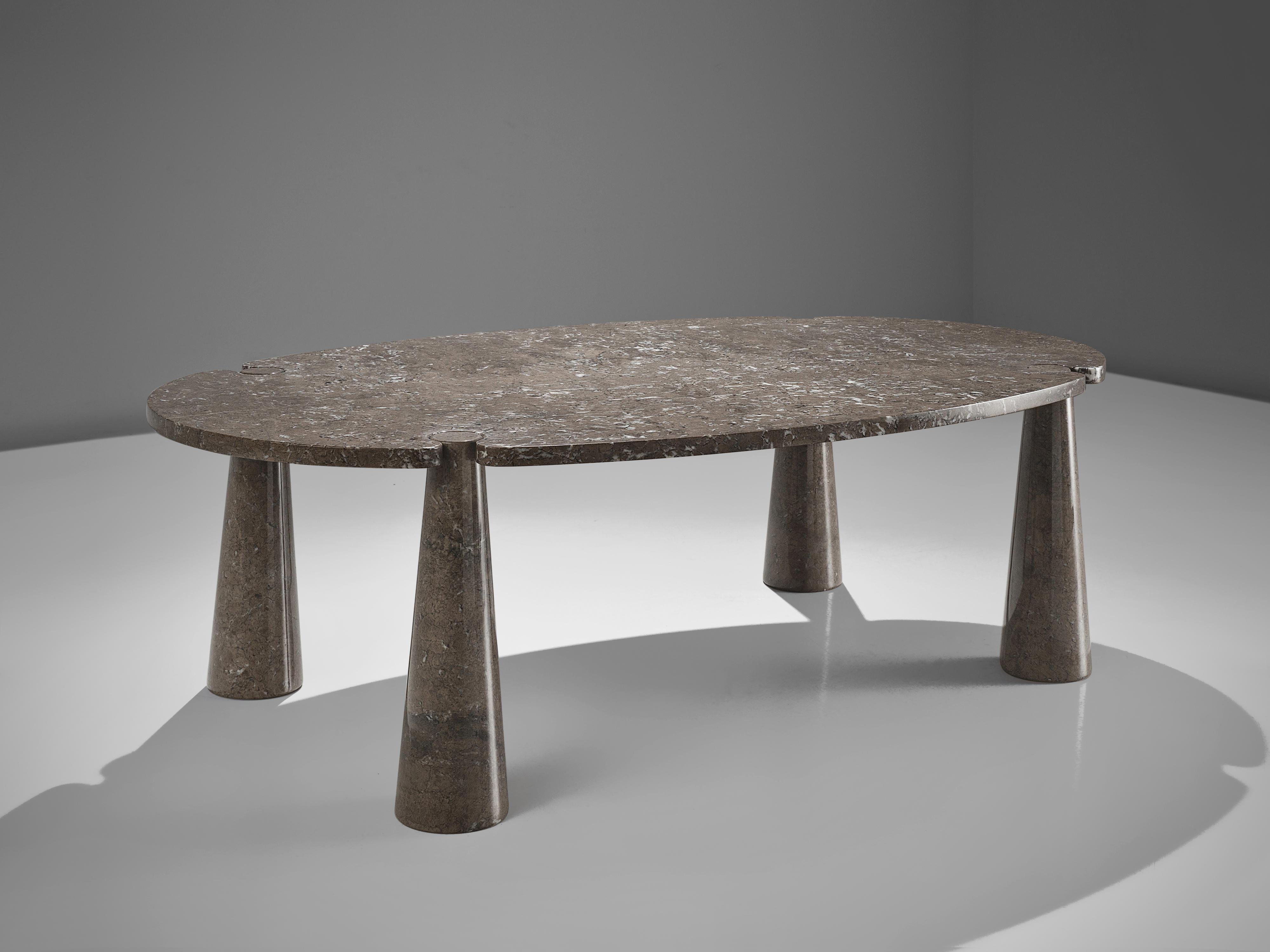 Angelo Mangiarotti, dining table 'Eros', marble, 1970s. 

This sculptural table by Angelo Mangiarotti is a skillful example of postmodern design. The table is executed in grey marble. The oval table features no joints or clamps and is