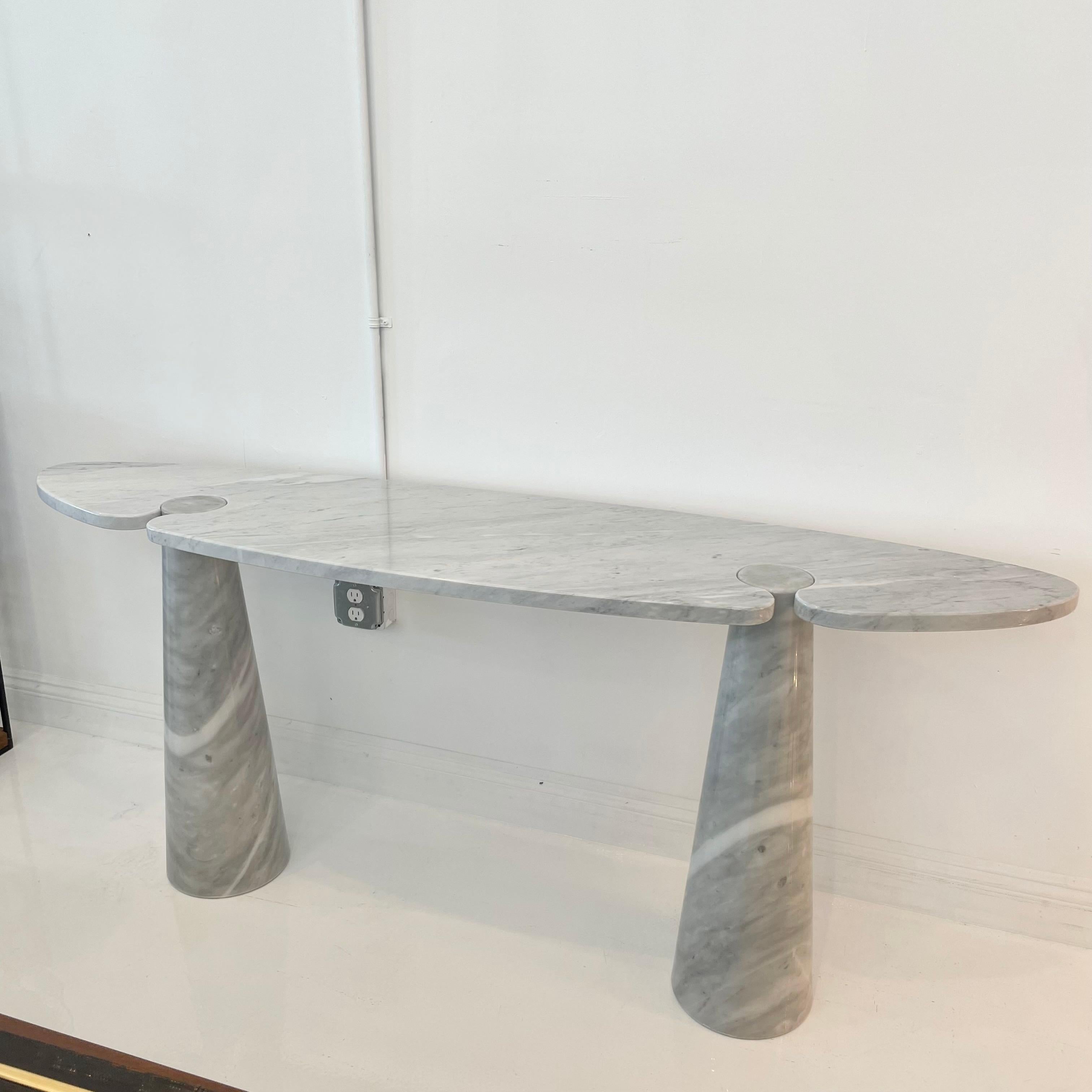 Elegant Carrara marble console table by Angelo Mangiarotti. Timeless style and simplicity as well as beautiful raw materials are what make this piece so special and sought after. Perfect to elevate any space. White and blue/grey veins run throughout