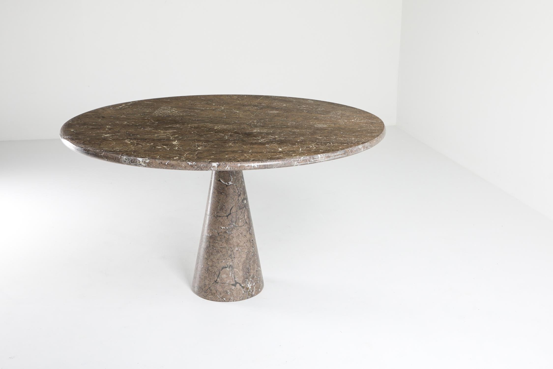 Eros Postmodern round dining table by Angelo Mangiarotti in mondragone marble, Skipper, Italy, 1970s.

A stunning 'Eros' table designed by Angelo Mangiarotti in 1971 and produced by Skipper. The solid marble table features an ingenious gravity