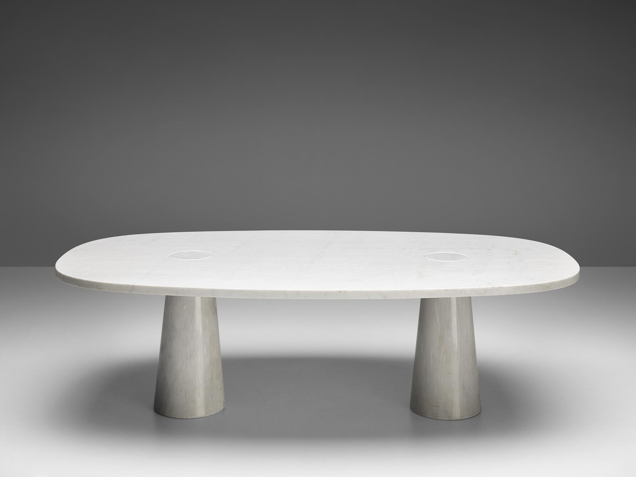 Angelo Mangiarotti, dining table, marble, 1970s.

This sculptural table by Angelo Mangiarotti is a skillful example of postmodern design. The table is executed in white marble. The oval table features no joints or clamps and is architectural in