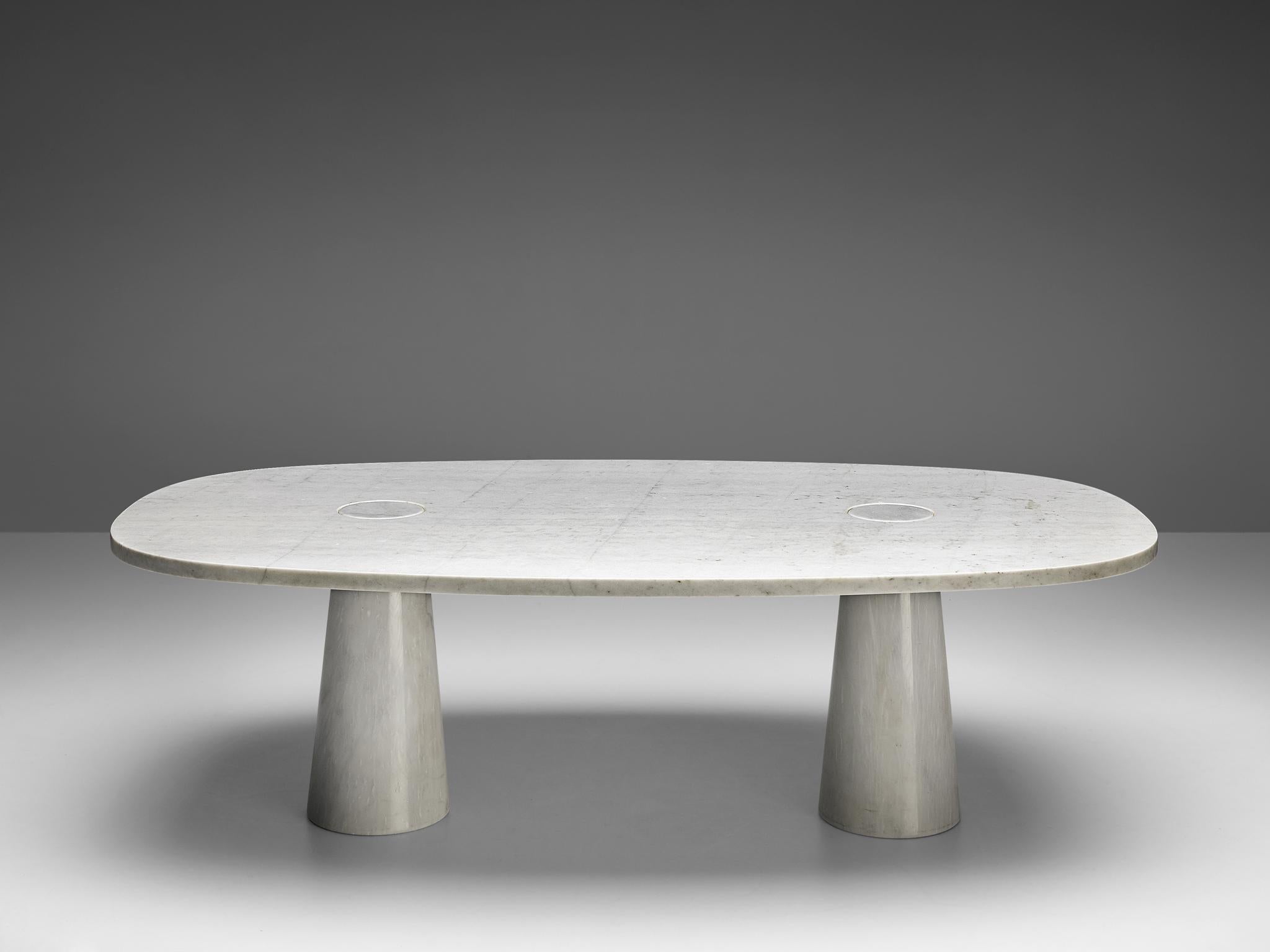 Angelo Mangiarotti, dining table, marble, 1970s.

This sculptural table by Angelo Mangiarotti is a skillful example of postmodern design. The table is executed in white marble. The oval table features no joints or clamps and is architectural in its