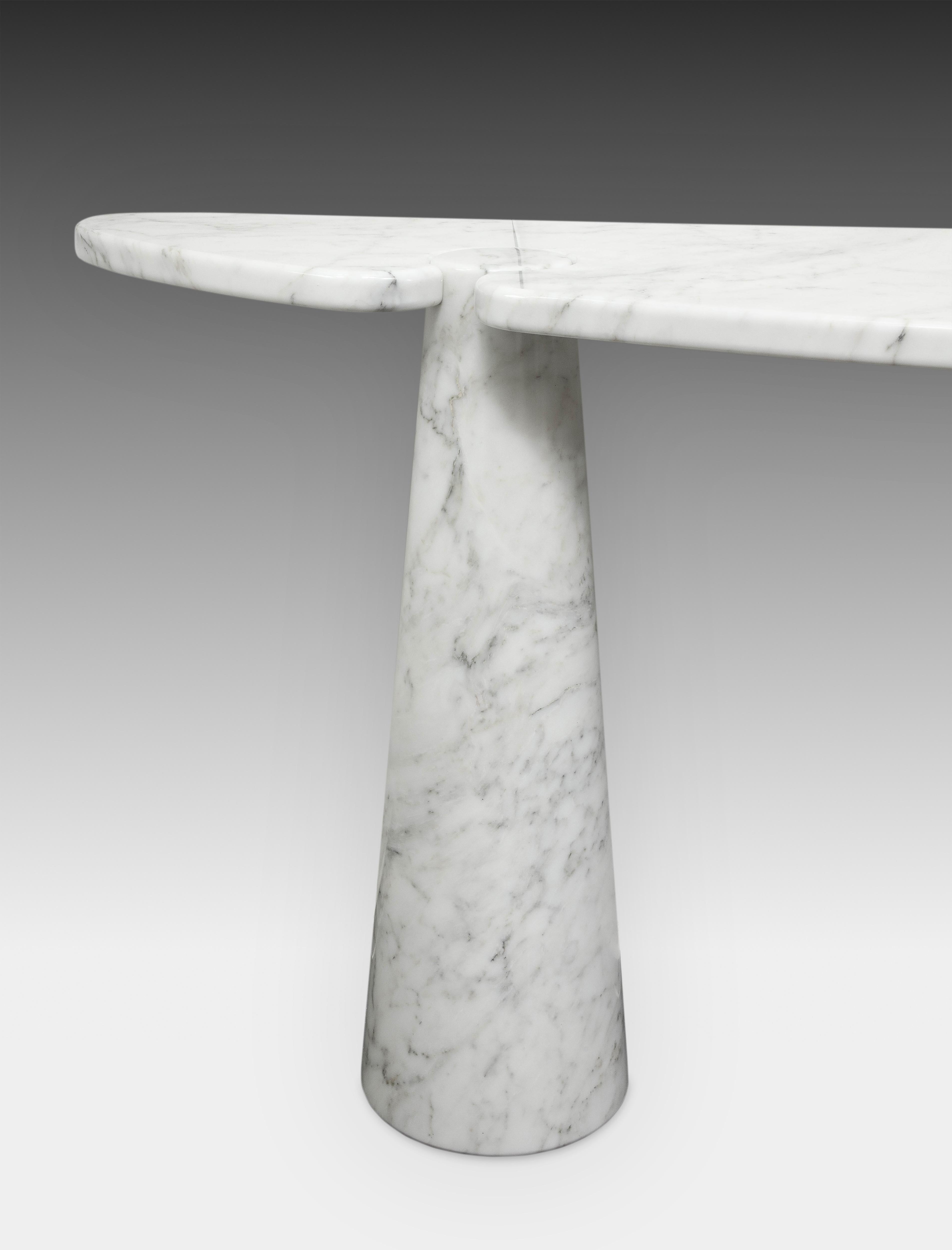 Designed by Angelo Mangiarotti for Skipper from the Eros series, iconic Carrara marble console table with large elliptical top fitted on two conical bases. This elegantly organic console table has beautiful subtle veining throughout. Original