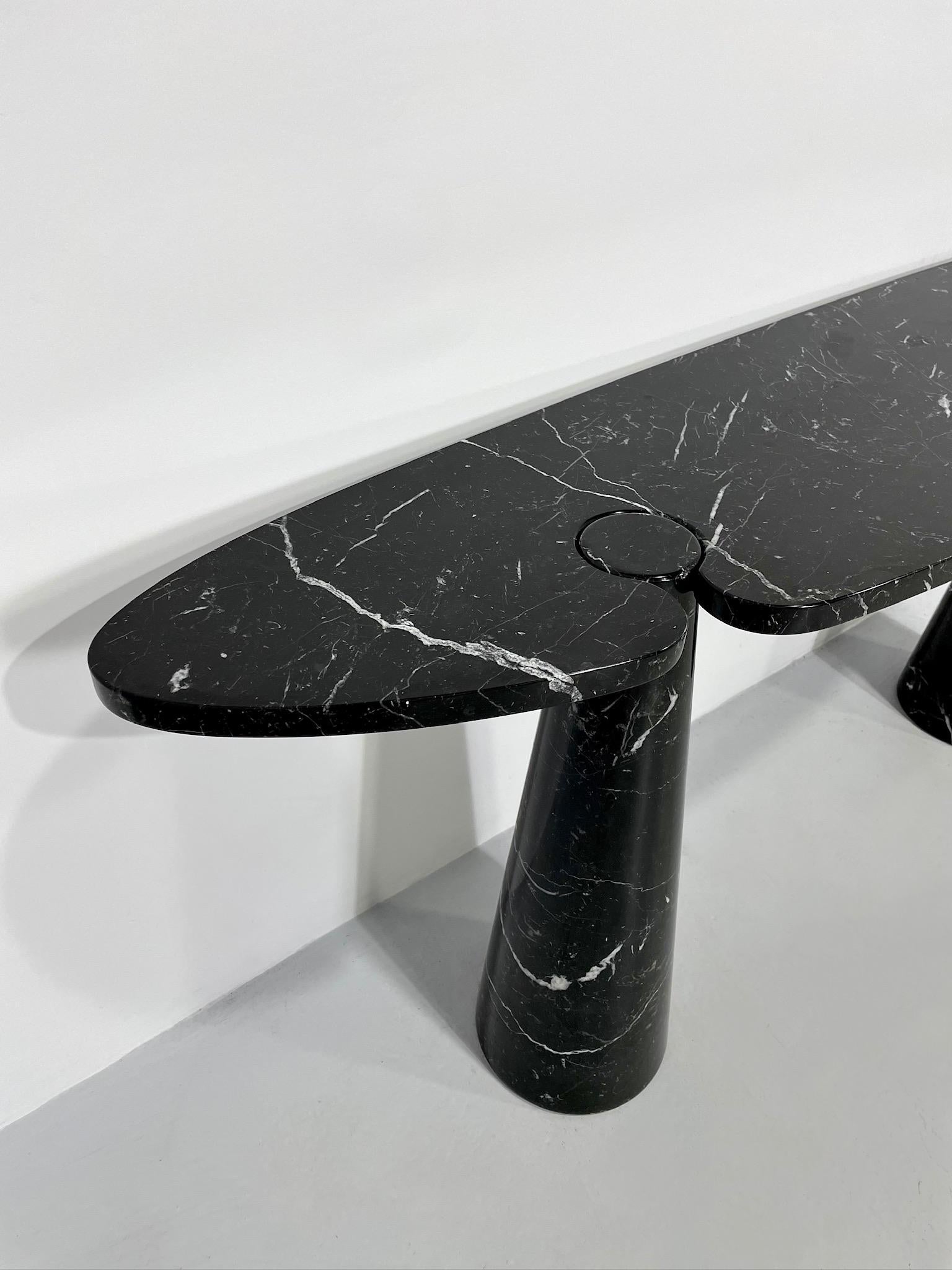 Angelo Mangiarotti Eros console table for Skipper, 1971; style of.

Surface has been professionally restored and polished. Beautifully cylindrical cone legs of solid marble with a crescent-shaped console top that sits around the legs. Price is