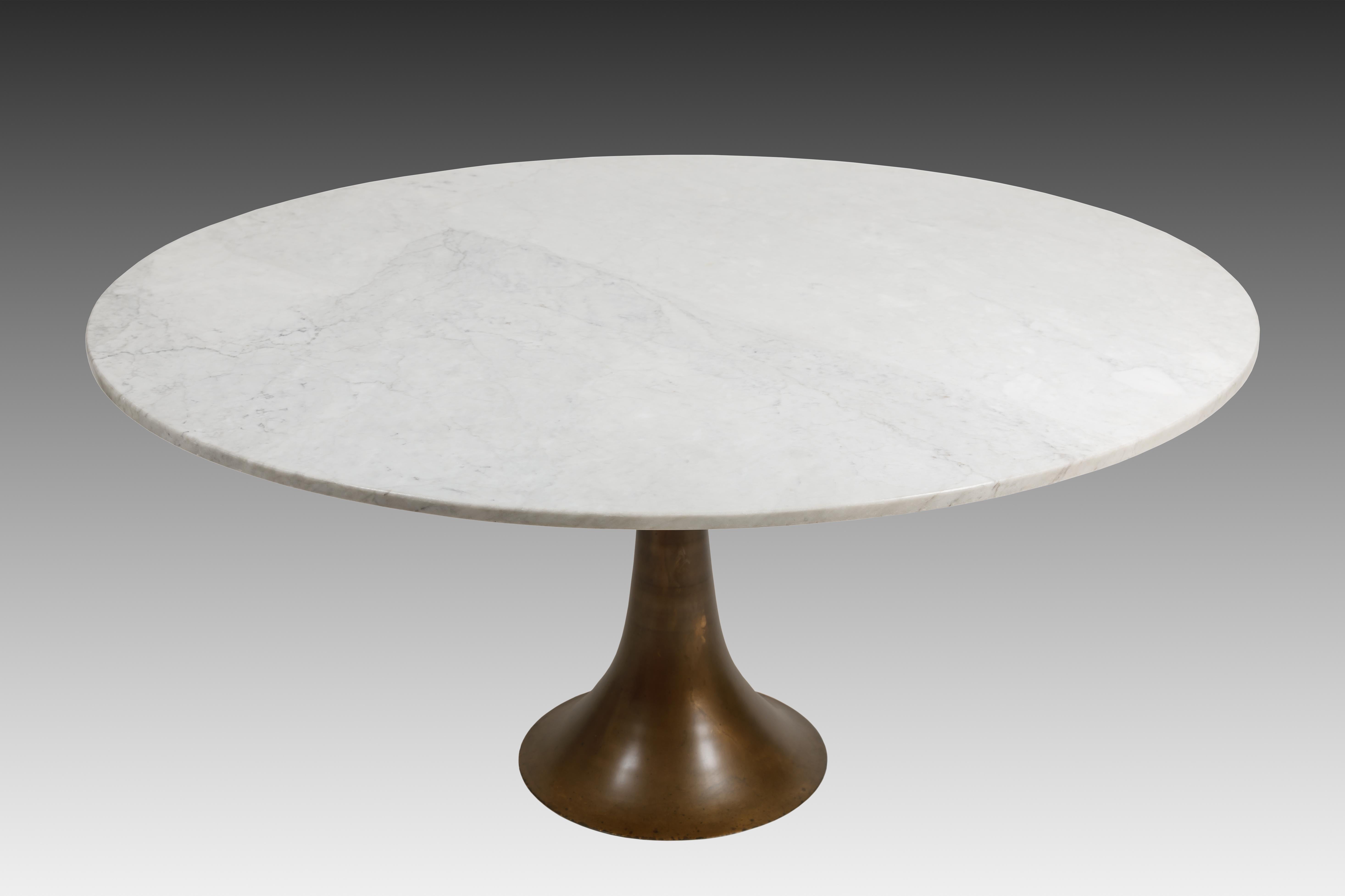 Designed by Angelo Mangiarotti and manufactured by Bernini early and rare dining or center table with original white Carrara marble top on bronze base by Fonderia Battaglia, Italy, 1959. The Carrara marble is beautifully veined and patinated with no