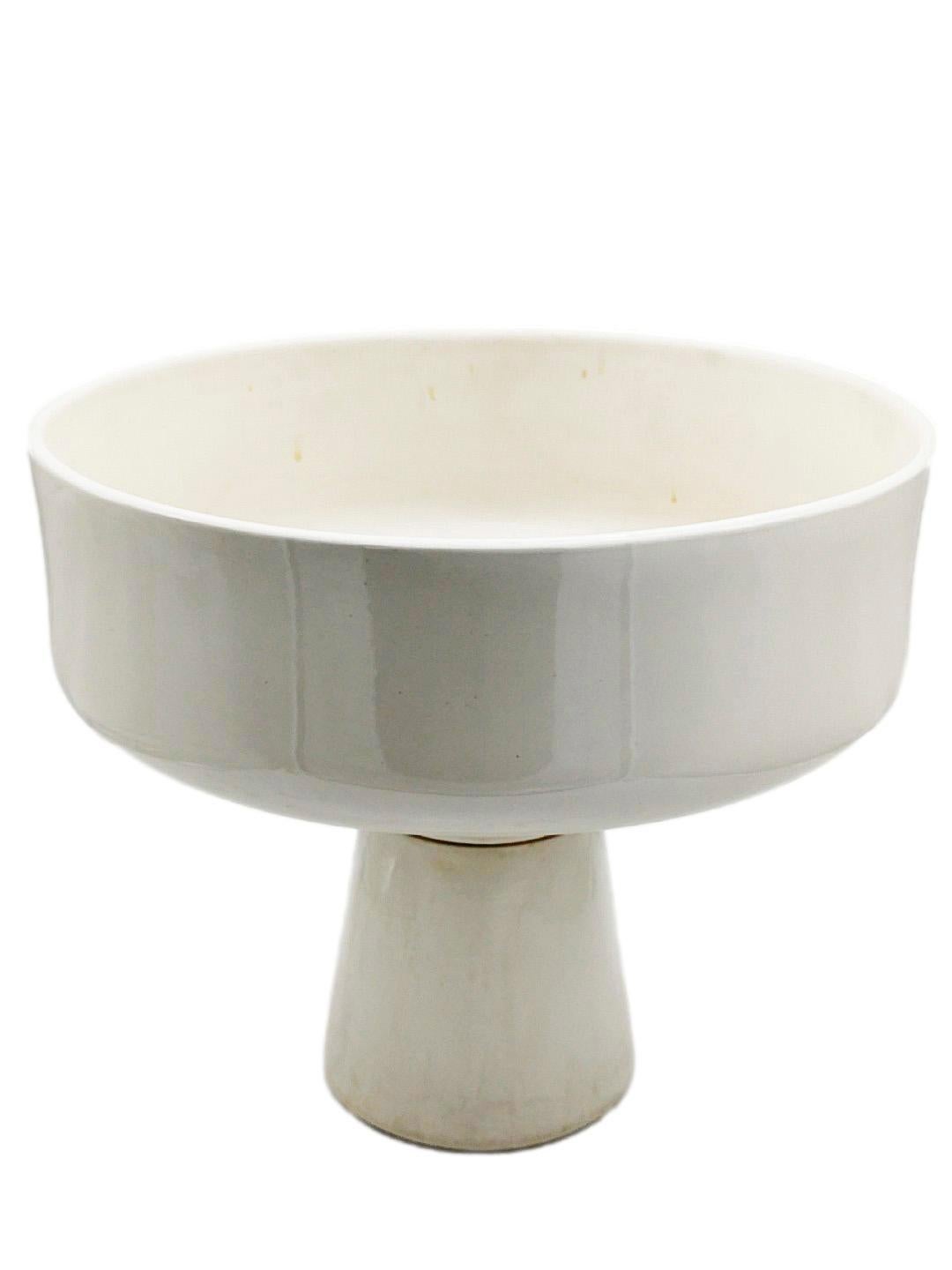 Large floor-standing planter in white porcelain stoneware, designed by Angelo Mangiarotti, composed of two separable pieces, a circular vase and a conical base. Embossed mark of the manufacturer Brambilla. 1965s. Good condition, some signs of ageing