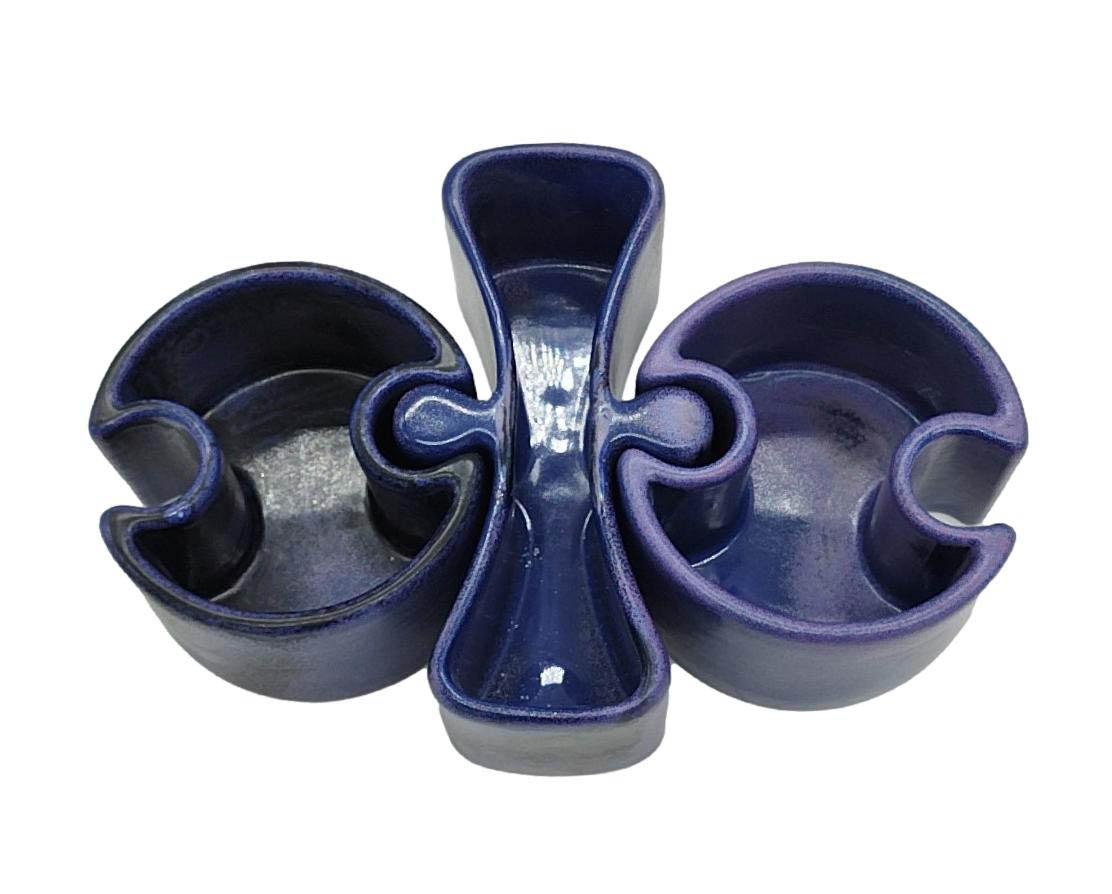 Centrepiece Serie M design Angelo Mangiarotti for Brambilla composed of 3 interlocking ceramic bowls. With mark impressed in the ceramic and stamps on the bottom. Oxide-treated ceramic with colour castings ranging from violet to blue.