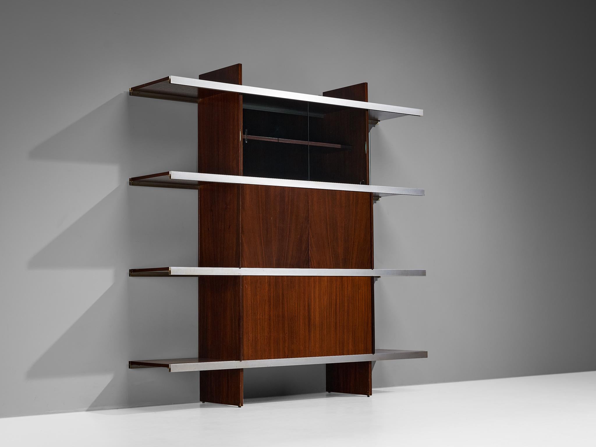 Angelo Mangiarotti for Poltronova, wall unit from 'Multiuse Series', mahogany, aluminum, Italy, 1965

Beautiful bookcase or cabinet part of the 'Multiuse Series' that Mangiarotti designed for Poltronova in 1965. Known for his designs with marble,