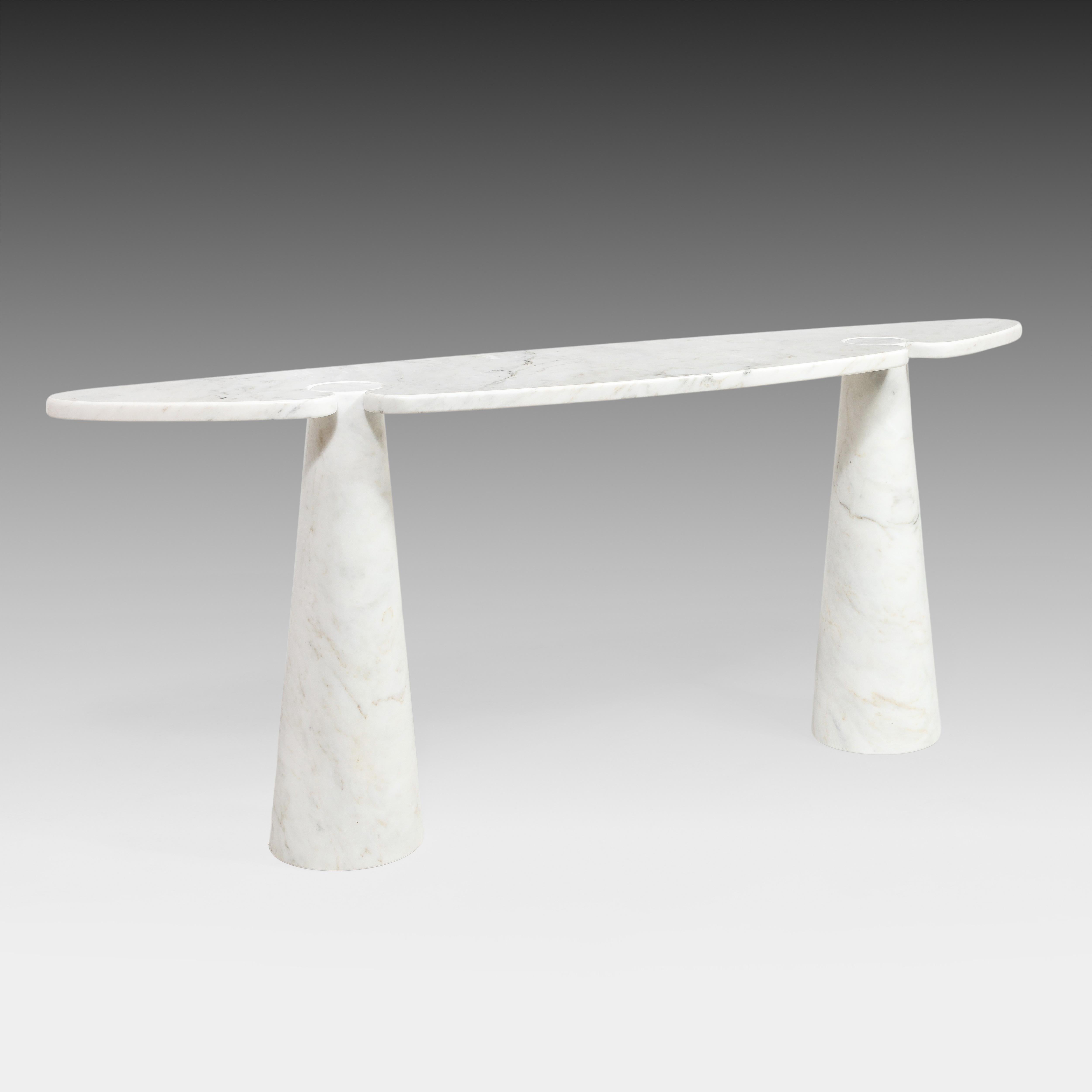 Designed by Angelo Mangiarotti for Skipper from the Eros series, iconic Carrara marble console table with large elliptical top fitted on two conical bases. This elegantly organic console table has beautiful subtle veining throughout. Original