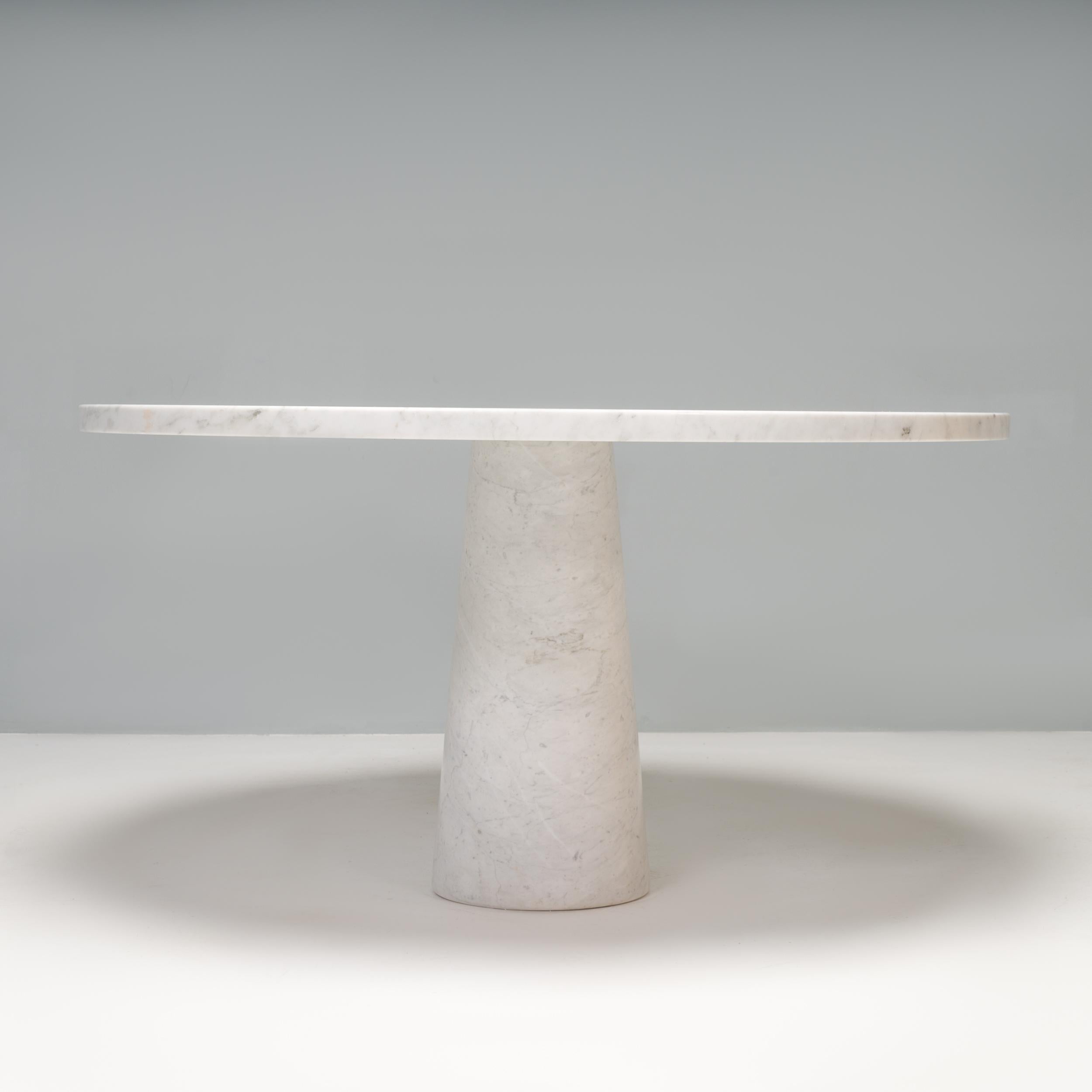 Designed by Angelo Mangiarotti for Skipper & Pollux in the 1960s, the M1 Table has since become an icon of mid century Italian design.

Constructed from solid carrara marble, the dining table features a conical base and smooth round table