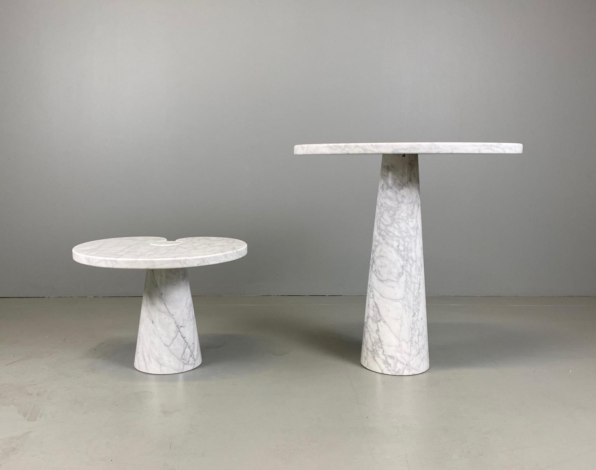 Designed by Angelo Mangiarotti for Skipper from the 'Eros' series, Carrara marble side table with top fitted on conical bases, Italy, 1971. Original Skipper label.
Measures: The big H 72 cm x W 66 cm x D 45 cm
The little H 40 cm x W 55 cm x D 46