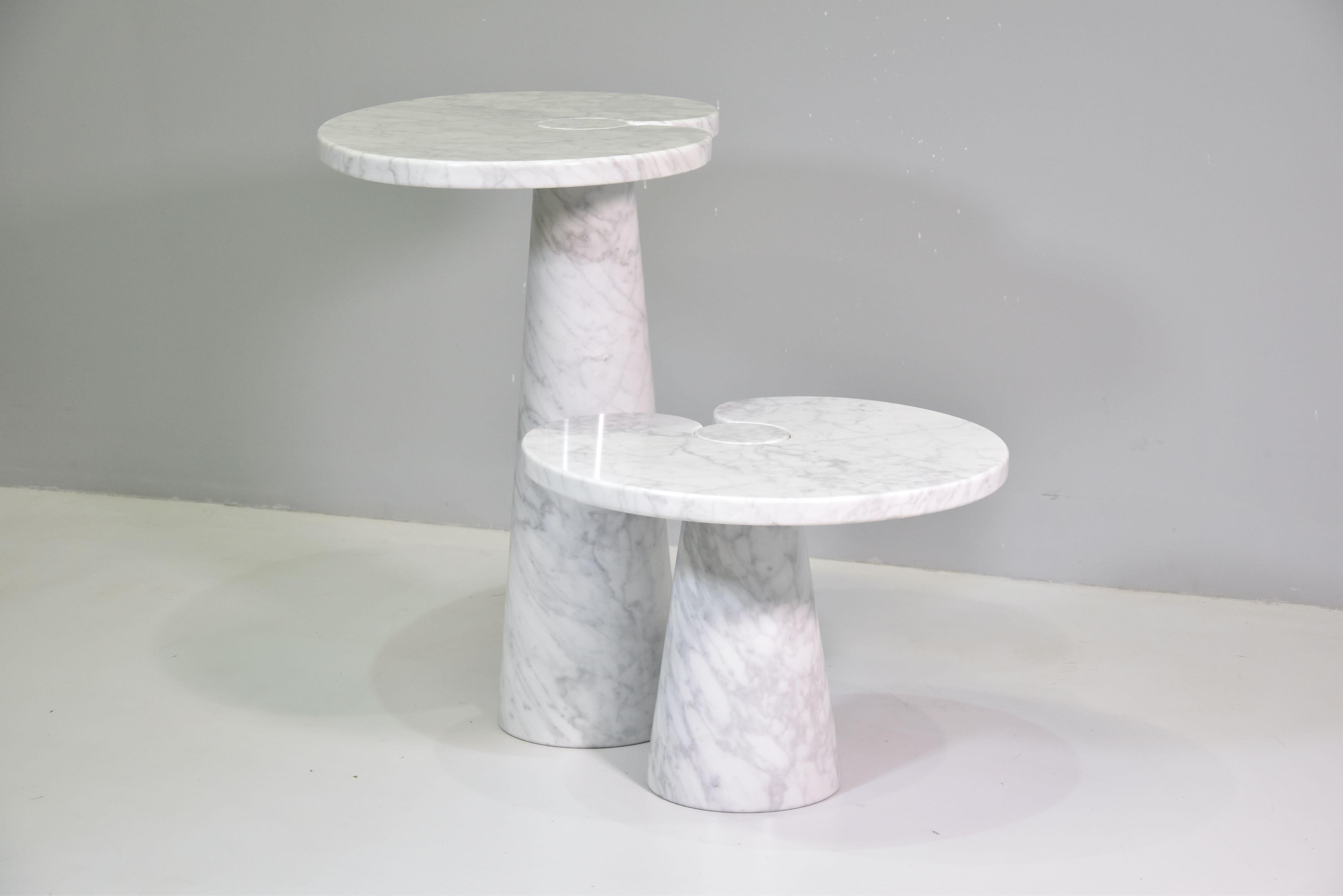 Designed by Angelo Mangiarotti for Skipper from the 'Eros' series, Carrara marble side table with top fitted on conical bases, Italy, 1971. Original Skipper label.
Measures: The big H 72 cm x W 66 cm x D 45 cm
The little H 40 cm x W 55 cm x D 46