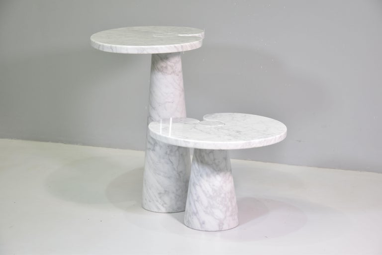 Designed by Angelo Mangiarotti for Skipper from the 'Eros' series, Carrara marble side table with top fitted on conical bases, Italy, 1971. Original Skipper label.
Measures: The big H 72 cm x W 66 cm x D 45 cm
The little H 40 cm x W 55 cm x D 46