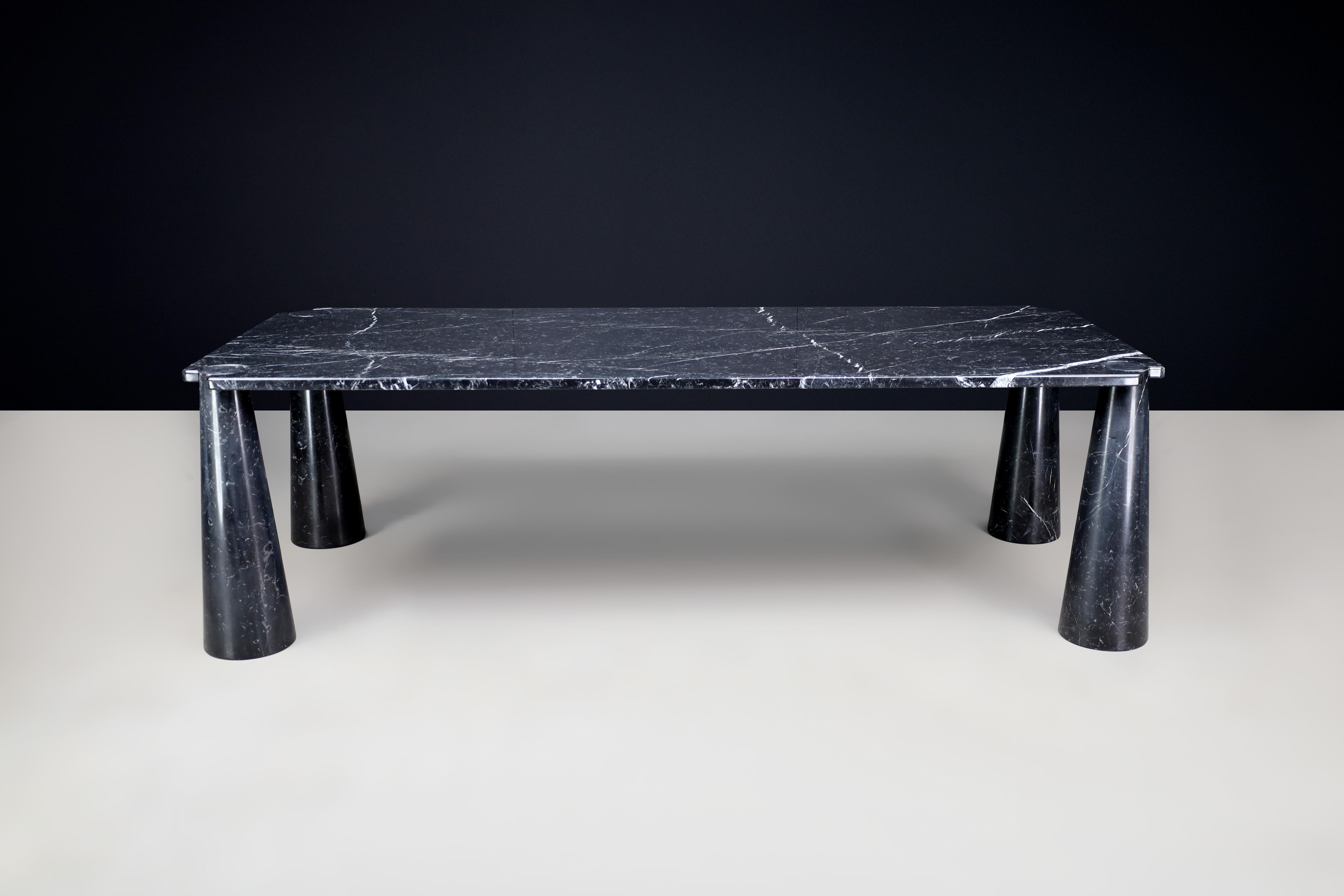Angelo Mangiarotti for Skipper 'Eros,' large rectangular dining table or executive desk in black Marquina Marble, Italy, the 1970s.

This stunning sculptural table, designed by Angelo Mangiarotti, showcases exceptional postmodern design. It is
