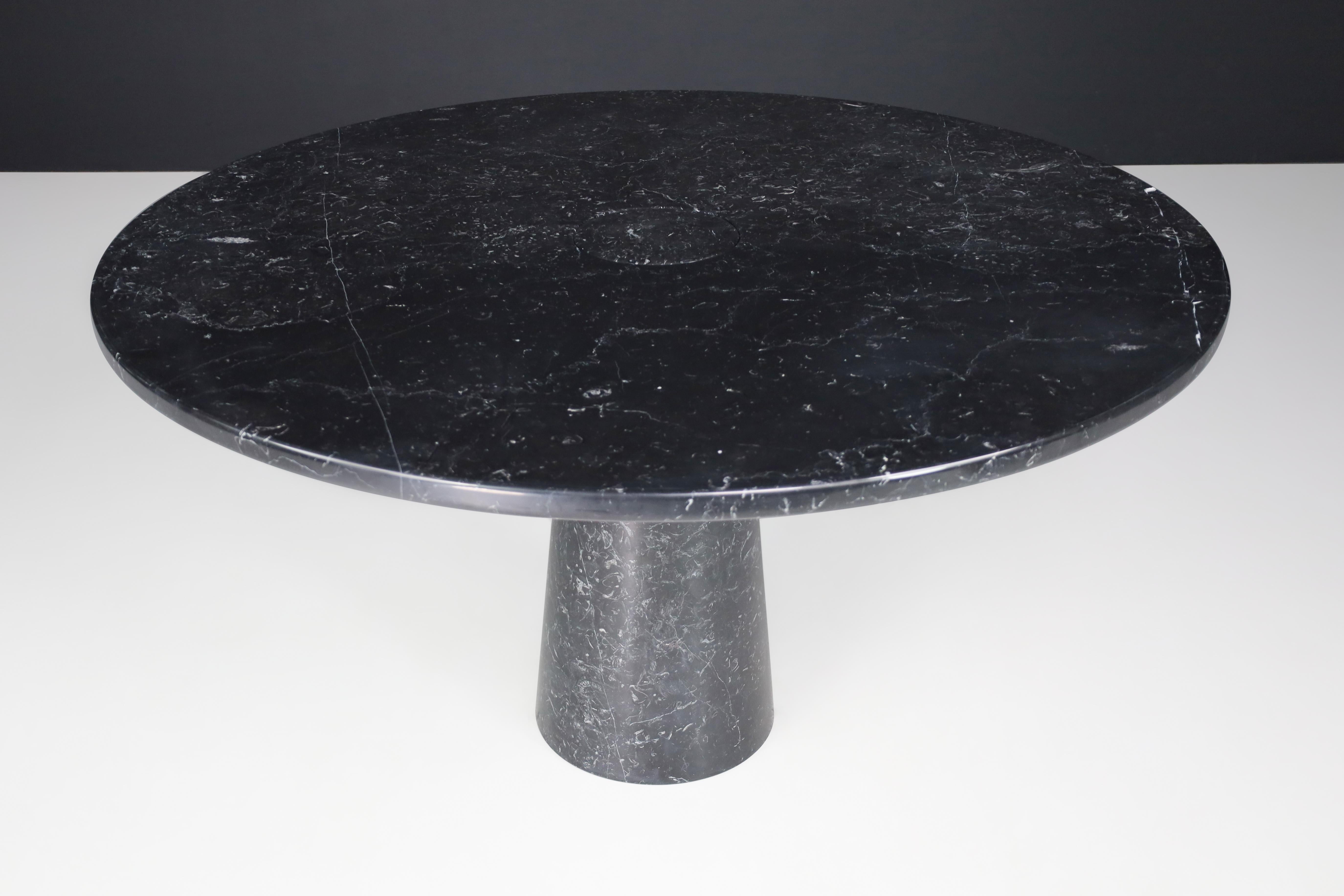 Angelo Mangiarotti for Skipper 'Eros' round dining table in Marquina Marble, Italy 1970s.

Angelo Mangiarotti created it for Skipper from the 'Eros' series, an iconic round dining table in Nero Marquina Marble. Gorgeous design with the conical
