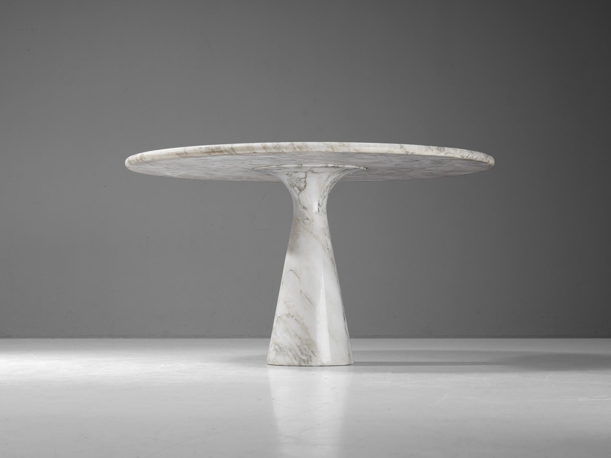 Angelo Mangiarotti for Skipper, dining table ‘M1’, Carrara marble, 1969

This sculptural table by Angelo Mangiarotti is a skilful example of postmodern design. The strikingly patterned white to grey table has a cone-shaped pedestal and a circular