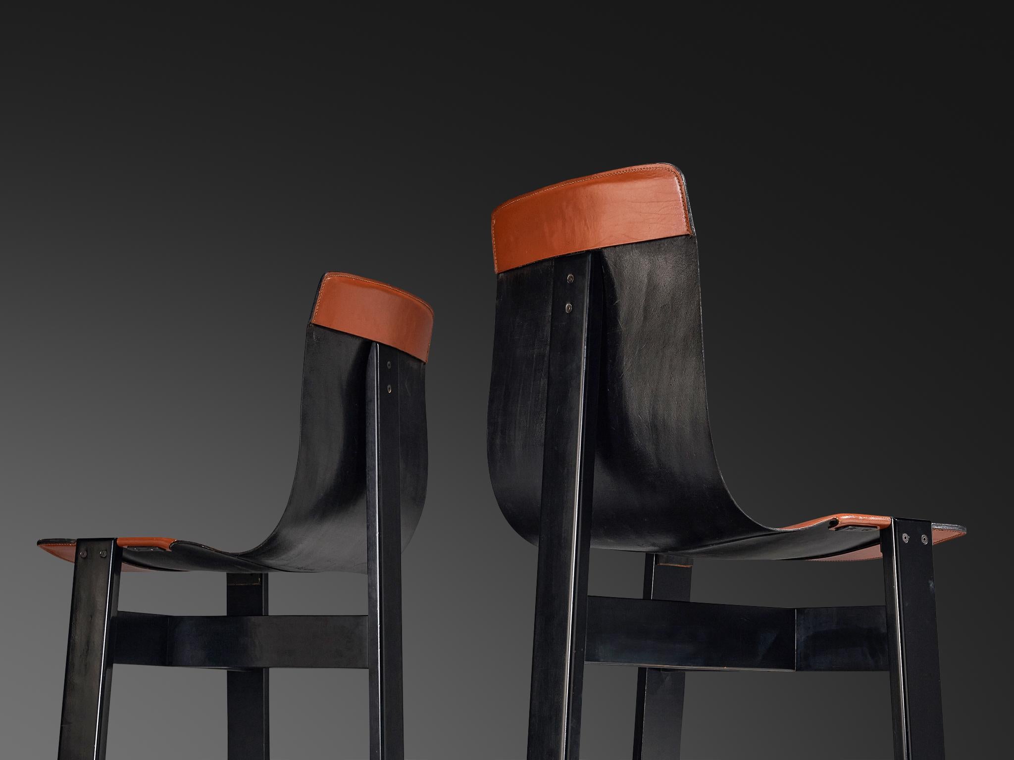Angelo Mangiarotti for Skipper, pair of chairs, model 'Tre 3', black lacquered wood, saddle leather, Italy, 1978

Set of 'Tre 3' dining chairs by the Italian designer Angelo Mangiarotti. The basic frame of these wonderful chairs consist of three