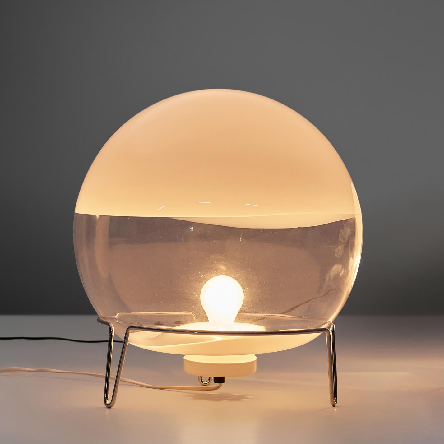 Angelo Mangiarotti for Skipper, table lamp, Murano glass, metal, Italy, 1980s

This beautiful lamp by Mangiarotti is executed in blown murano glass. The globe has a white half and a clear half. The light partition is wonderful and warm. The globe is