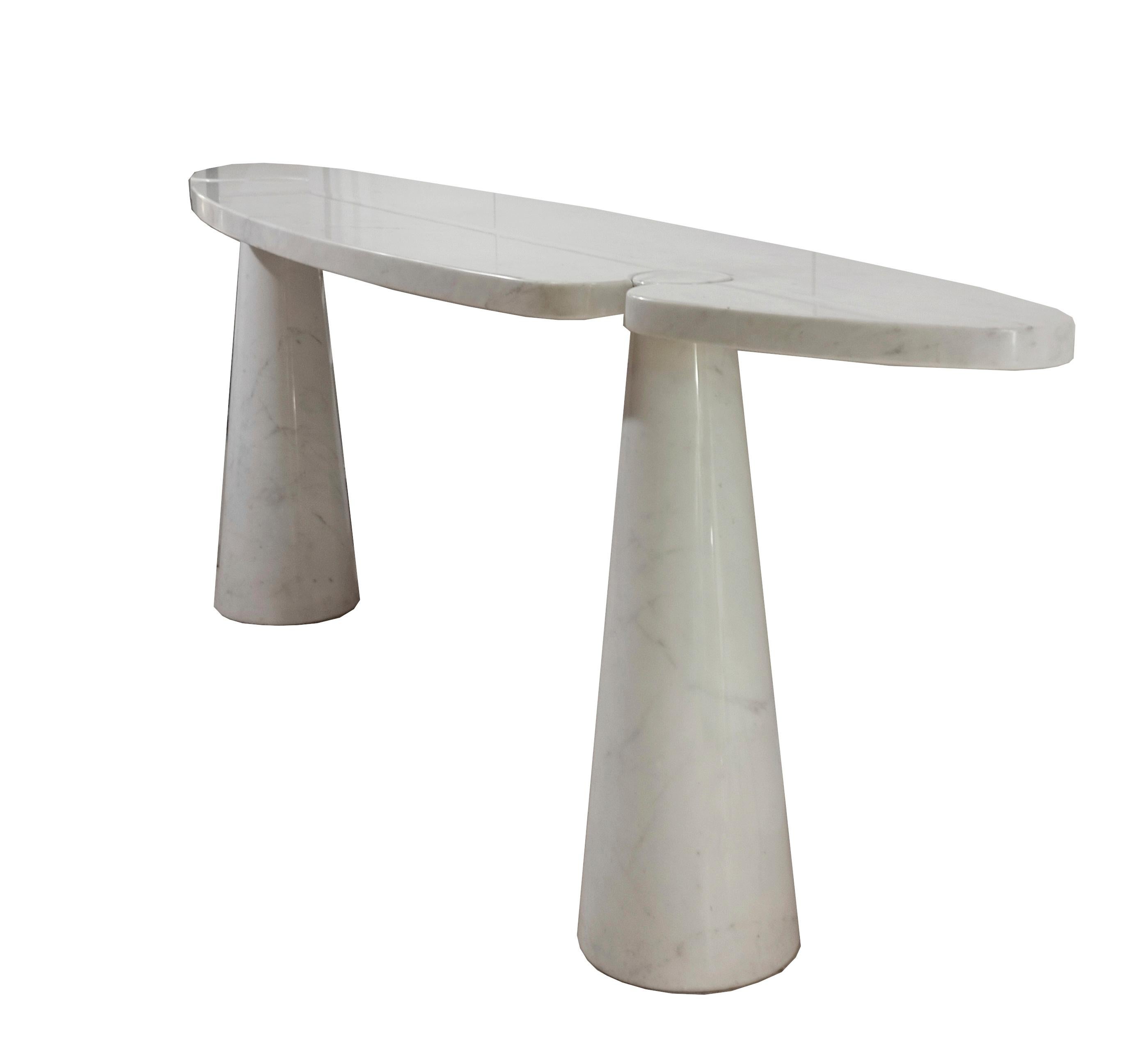 This rare and original white marble Eros table is from the first edition designed by Italian architect and designer Angelo Mangiarotti and produced by Sipper in 1971. 
Since then there have been a few re-editions, but none of these re-editions, let