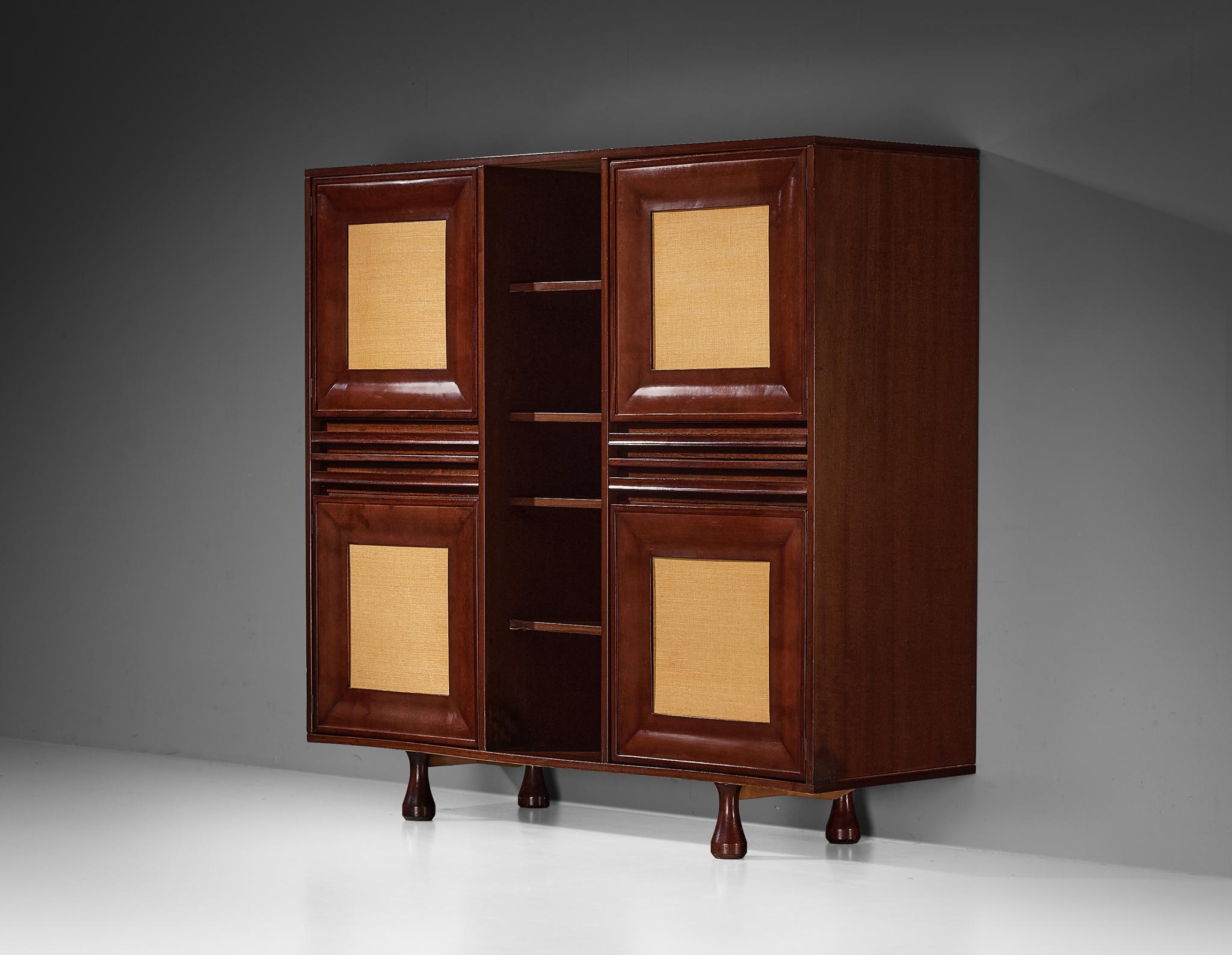 Angelo Mangiarotti for Sorgente dei Mobili, cabinet, mahogany, grasscloth, Italy, 1960s

This outstanding sideboard, dating back to the 1960s, is a design by Angelo Mangiarotti produced for Sorgente dei Mobili. A cubistic layout comprised of four
