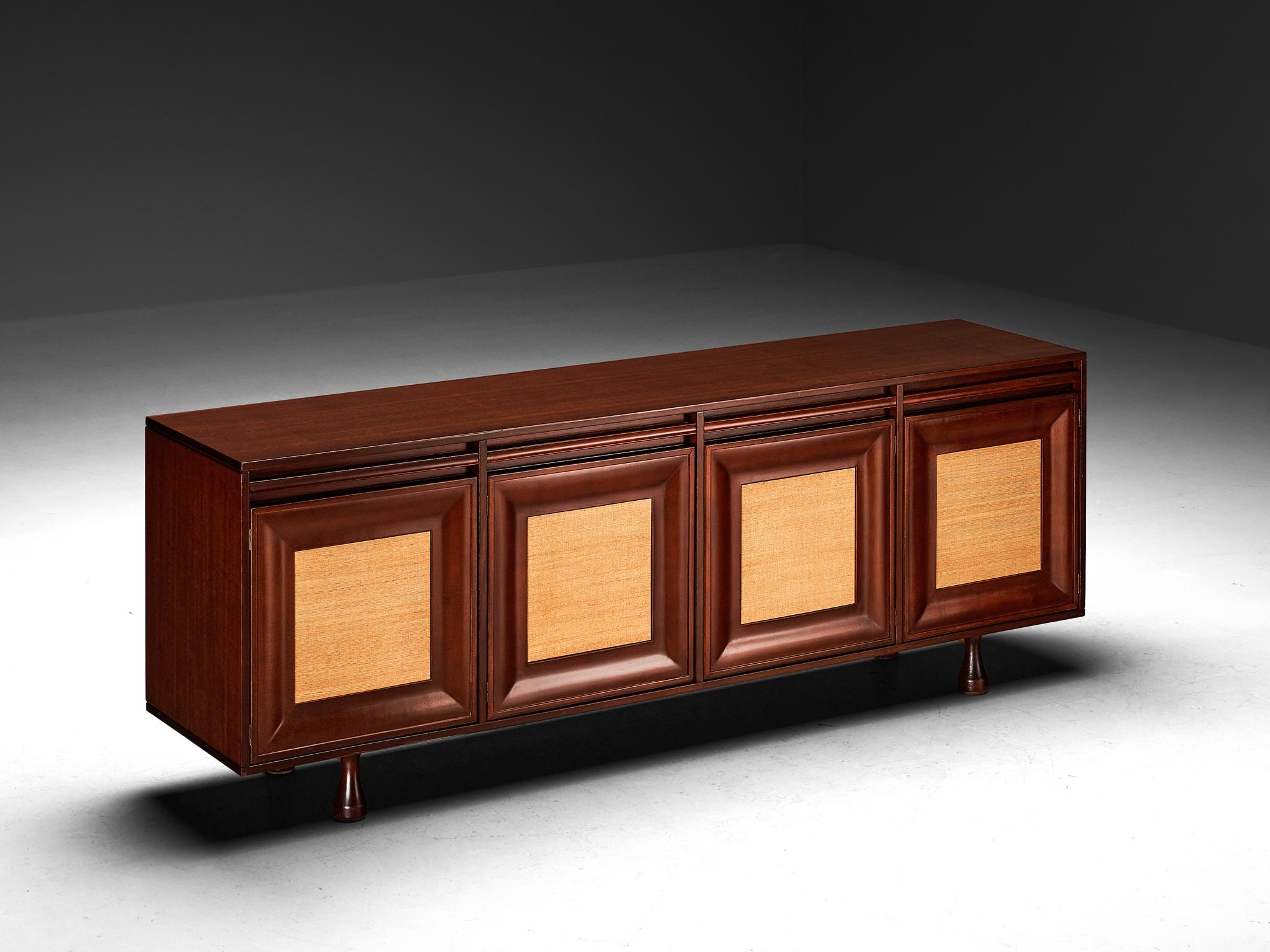 Angelo Mangiarotti for Sorgente dei Mobili, sideboard, mahogany, grasscloth, Italy, 1960s

This outstanding cabinet, dating back to the 1960s, is a design by Angelo Mangiarotti produced for Sorgente dei Mobili. A rectangular layout comprised of four