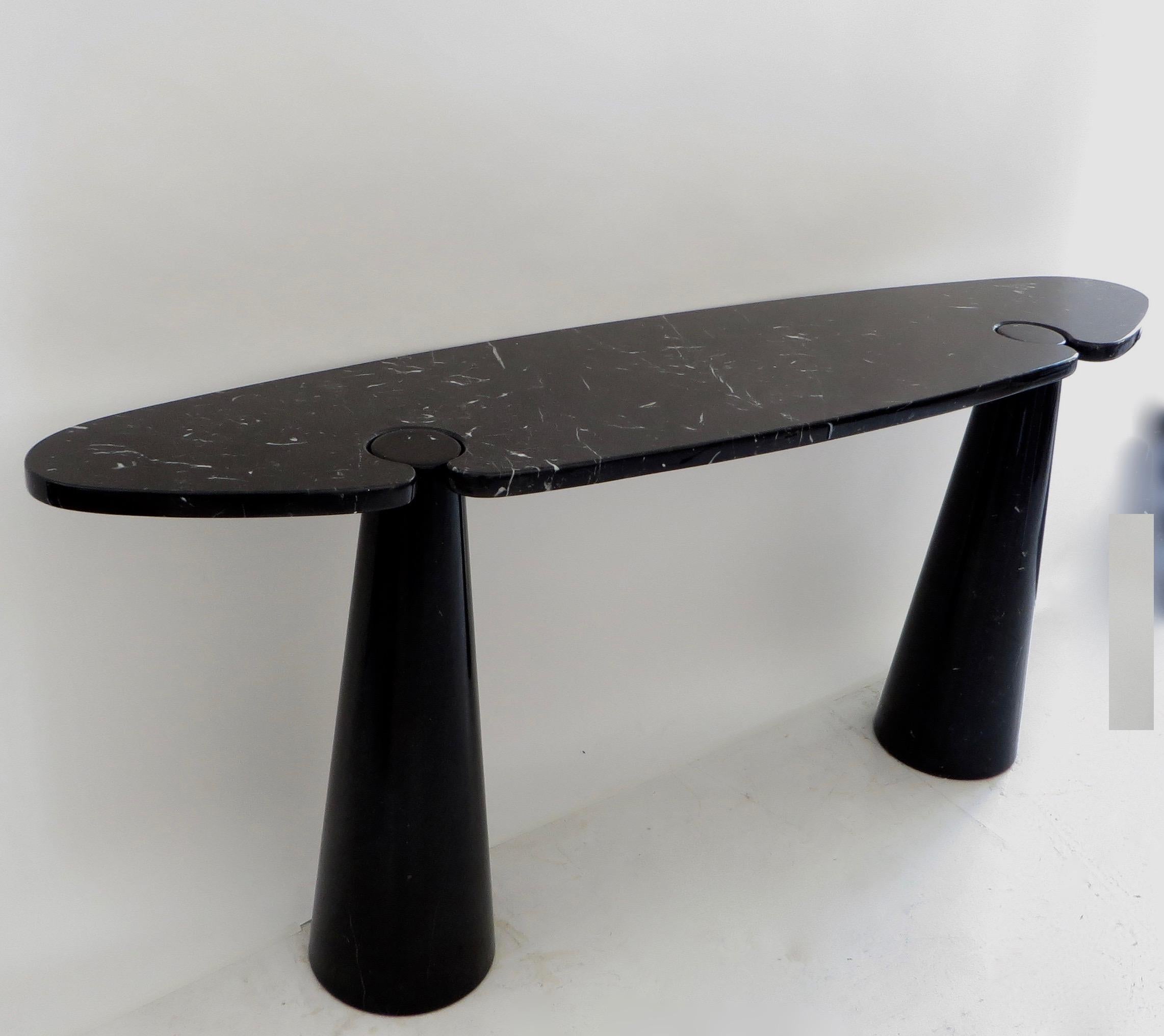 Angelo Mangiarotti vintage iconic Italian console Eros collection for Skipper, circa 1971.
The black or nero Marquina marble is nicely veined.
The top sits on the conical legs in the iconic Mangiarotti finely designed architectural manner.
No