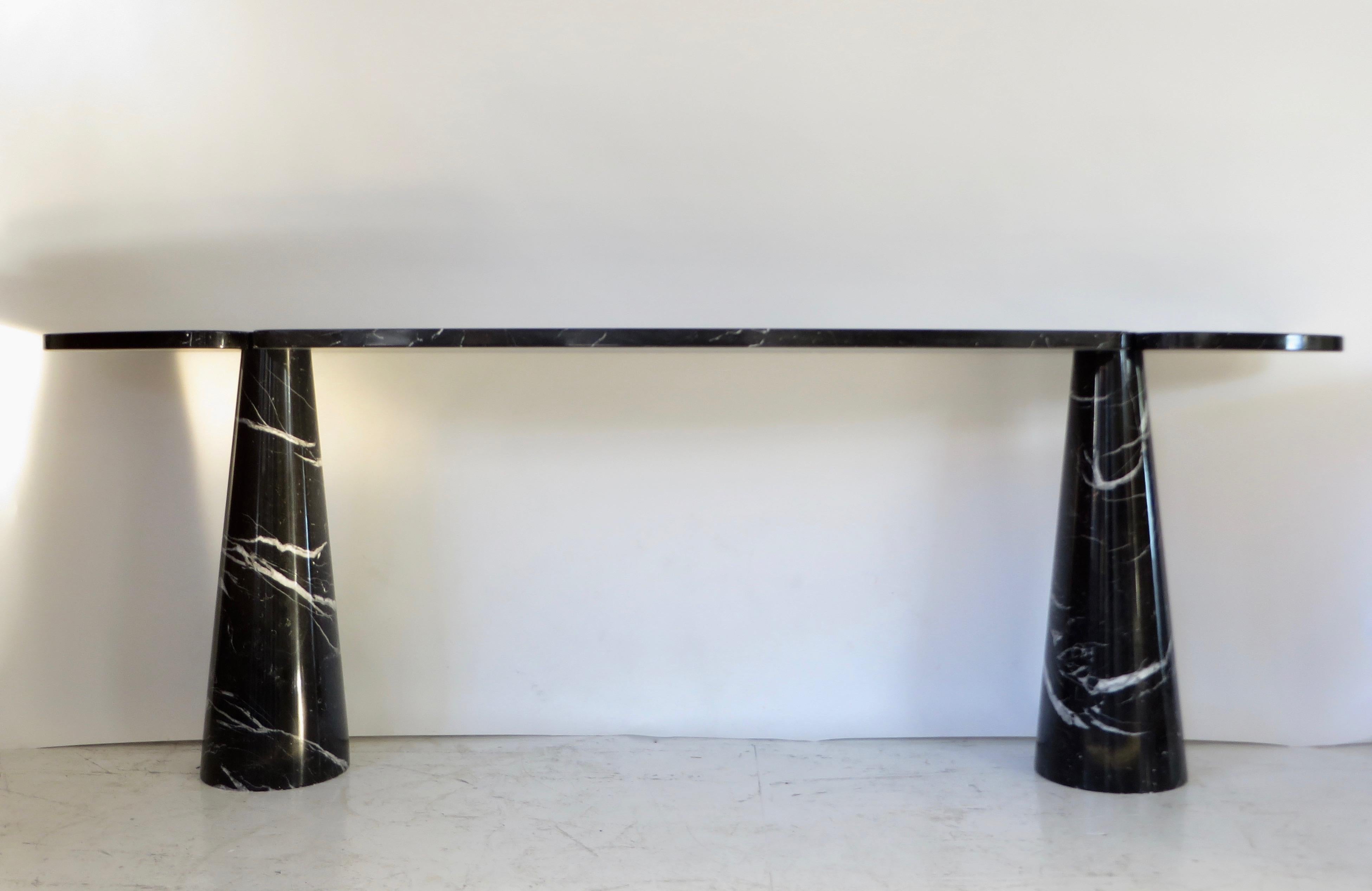Angelo Mangiarotti vintage iconic Italian console Eros collection for Skipper, circa 1971.
This console is extra long.
The black or Nero Marquina marble is nicely veined.
The top sits on the conical legs in the iconic Mangiarotti finely designed